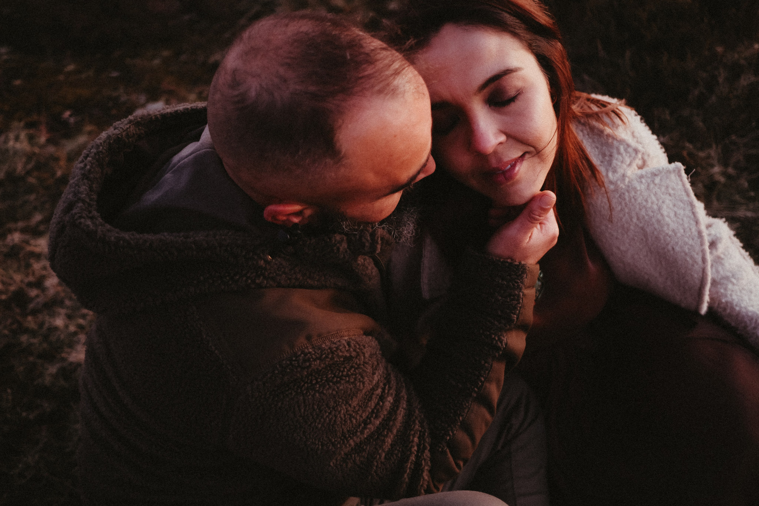 Moody forest engagement photography with organic and artistic feel