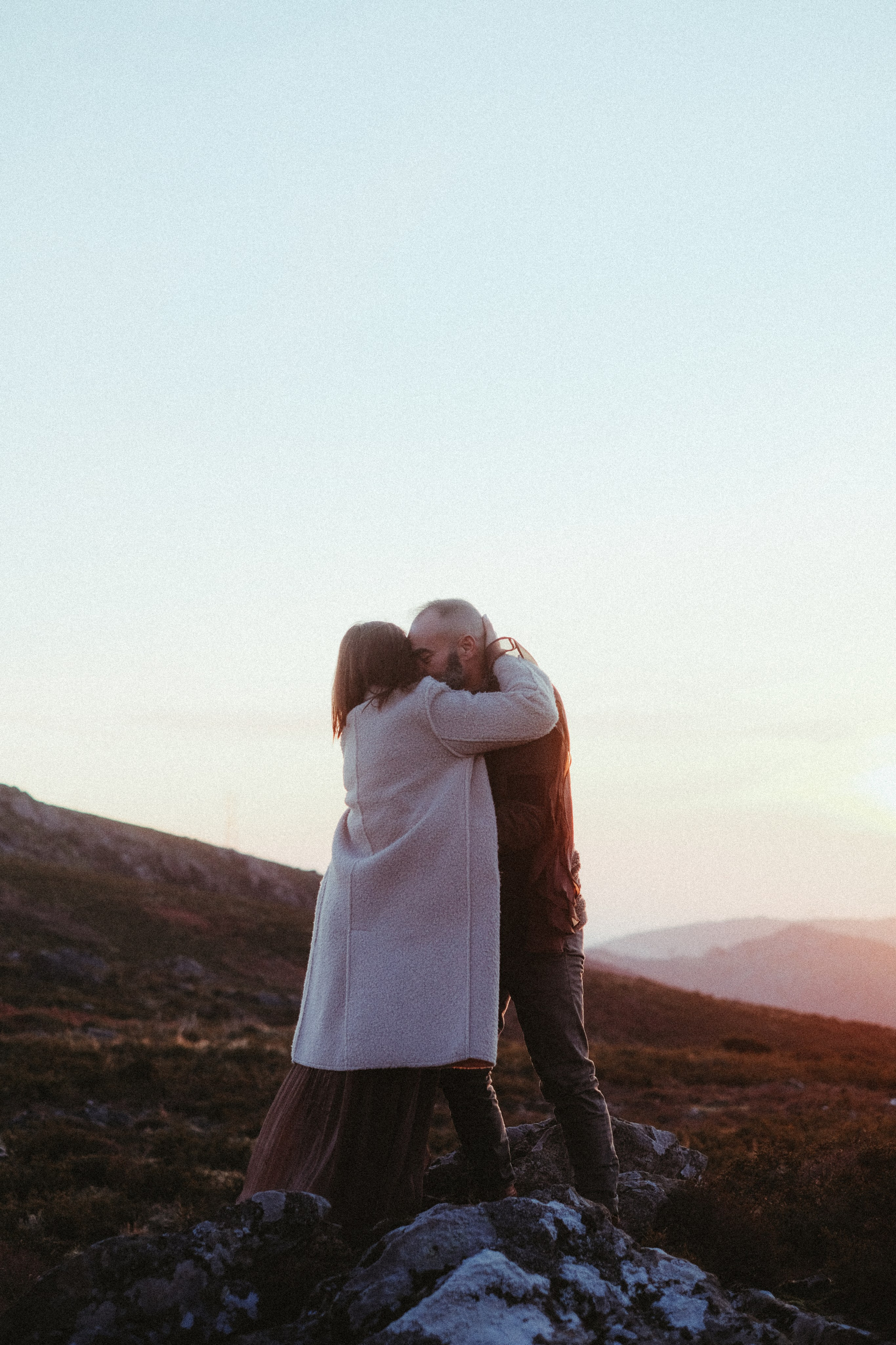 Couple walking through forest during engagement session in Portugal