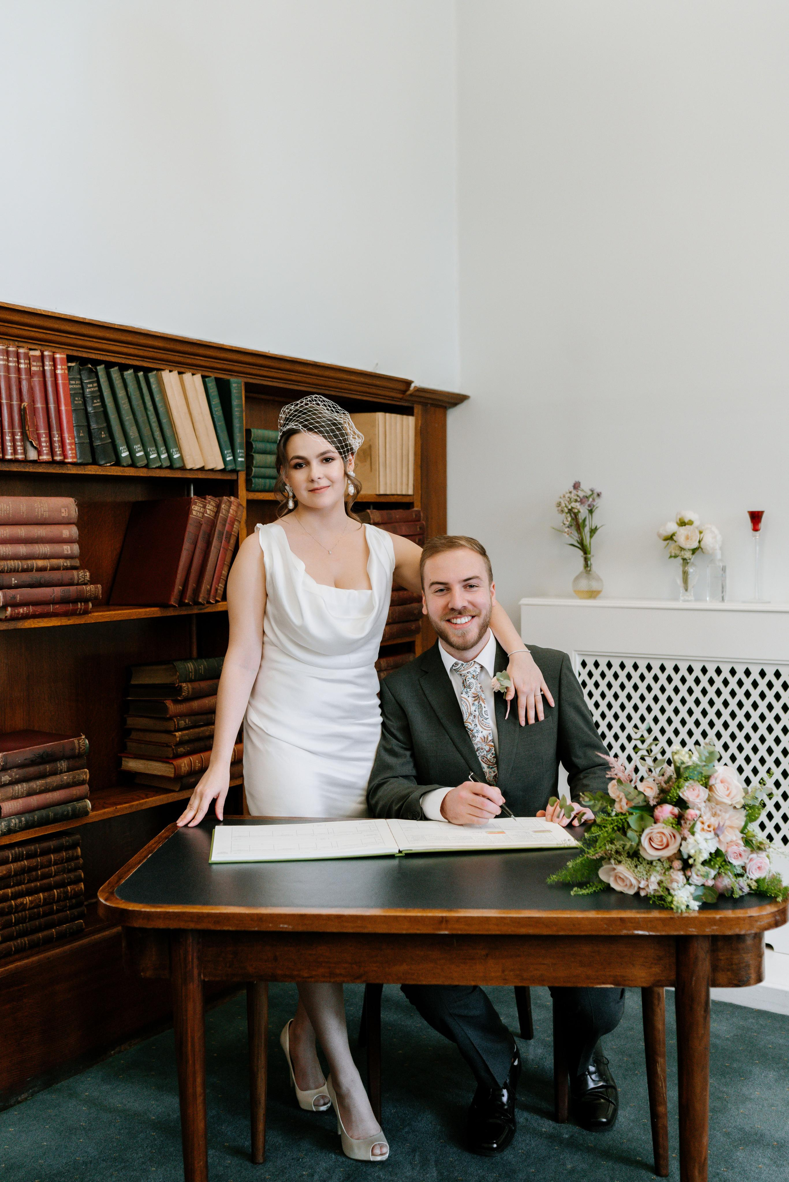 Wedding ceremony in Mayfair Library. London Wedding Photographer|Natasha Ferreira