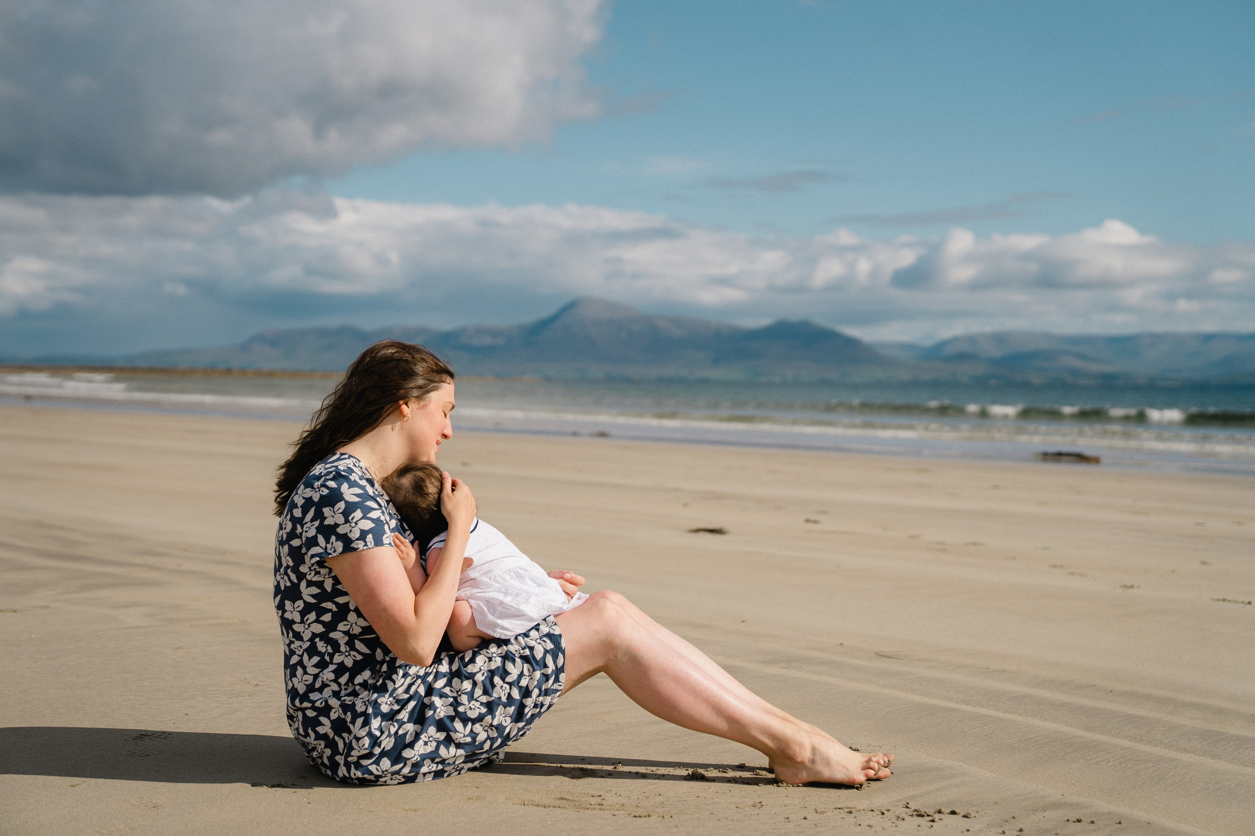 Darya and Mia at the ocean. Wedding and family photographer Ireland