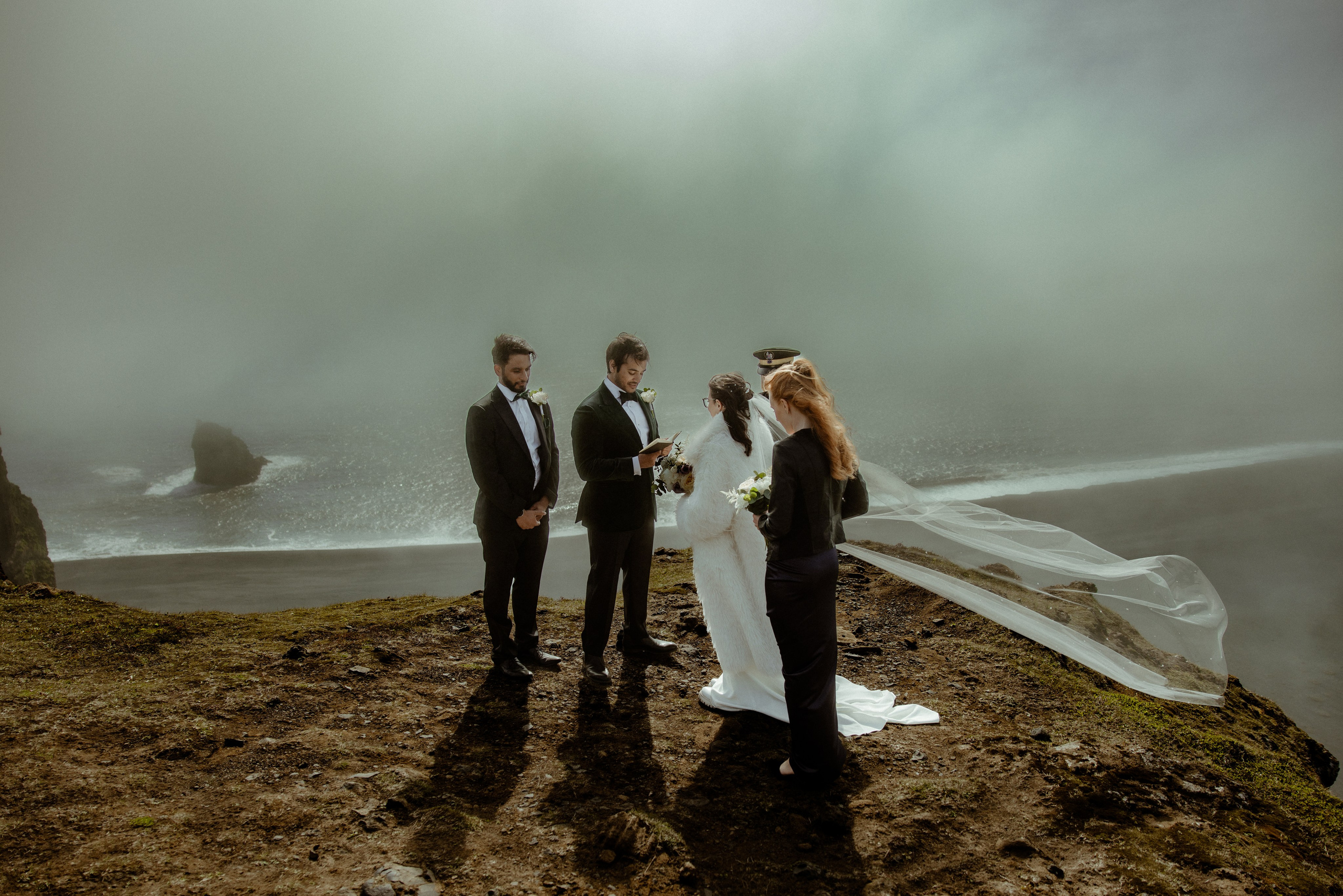 Iceland elopement at endless black sand beach. Iceland elopement photographer & videographer
