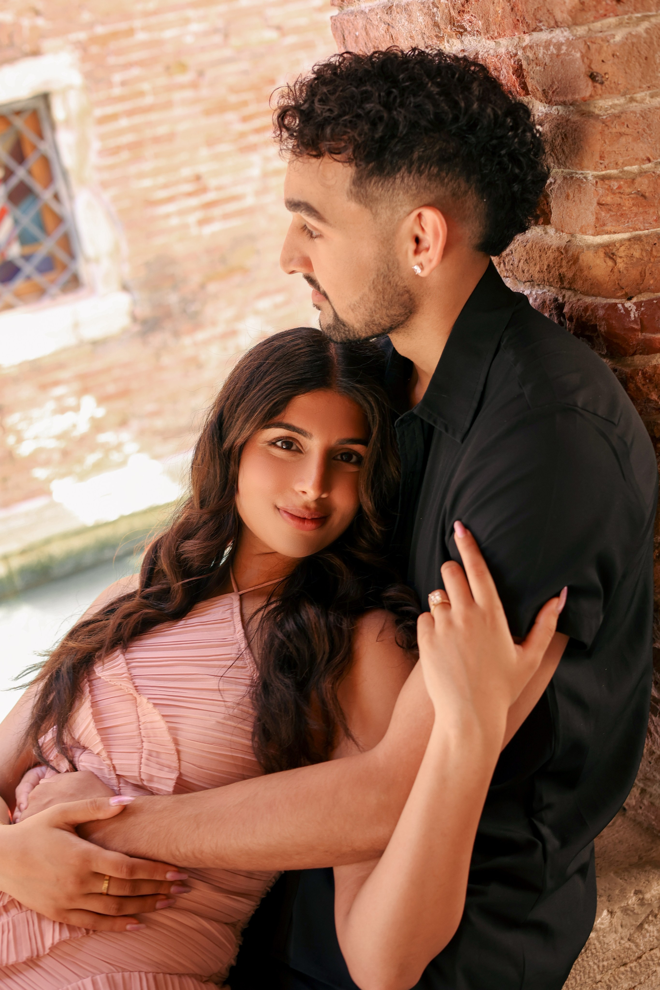 Proposal photographer capturing surprise engagement in Venice