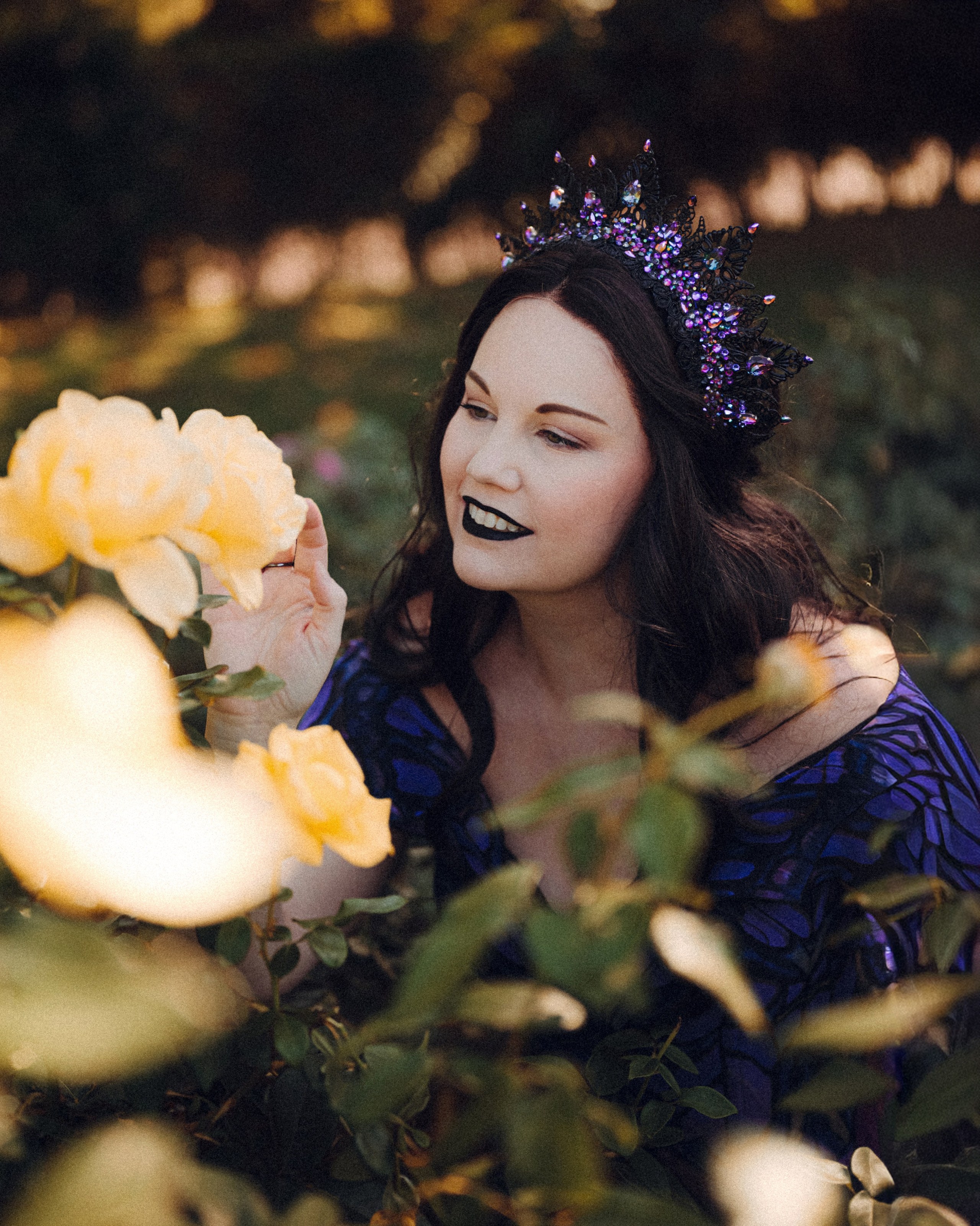 Butterfly purple fairy in a blooming garden. Moth & Moss Photography