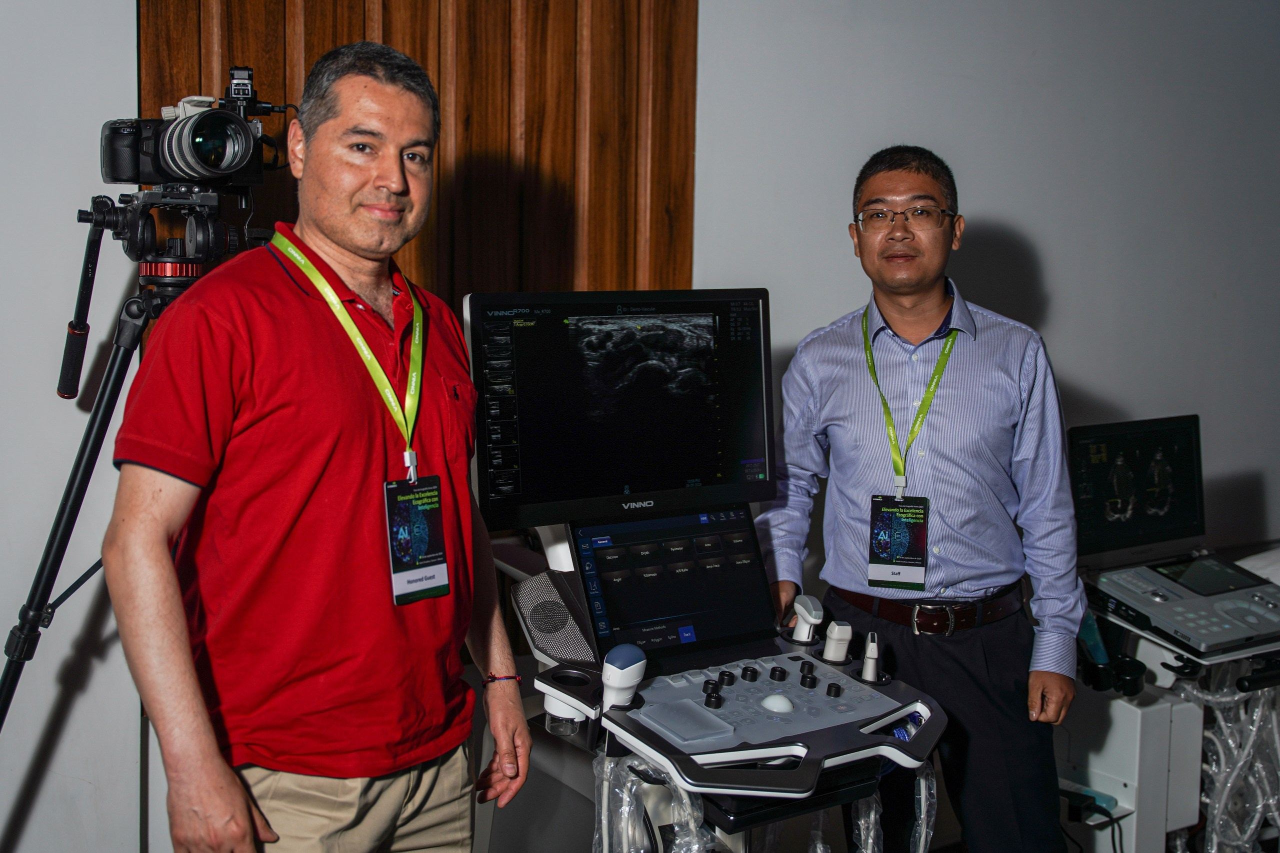 Audience watching live demonstration of innovative healthcare equipment.