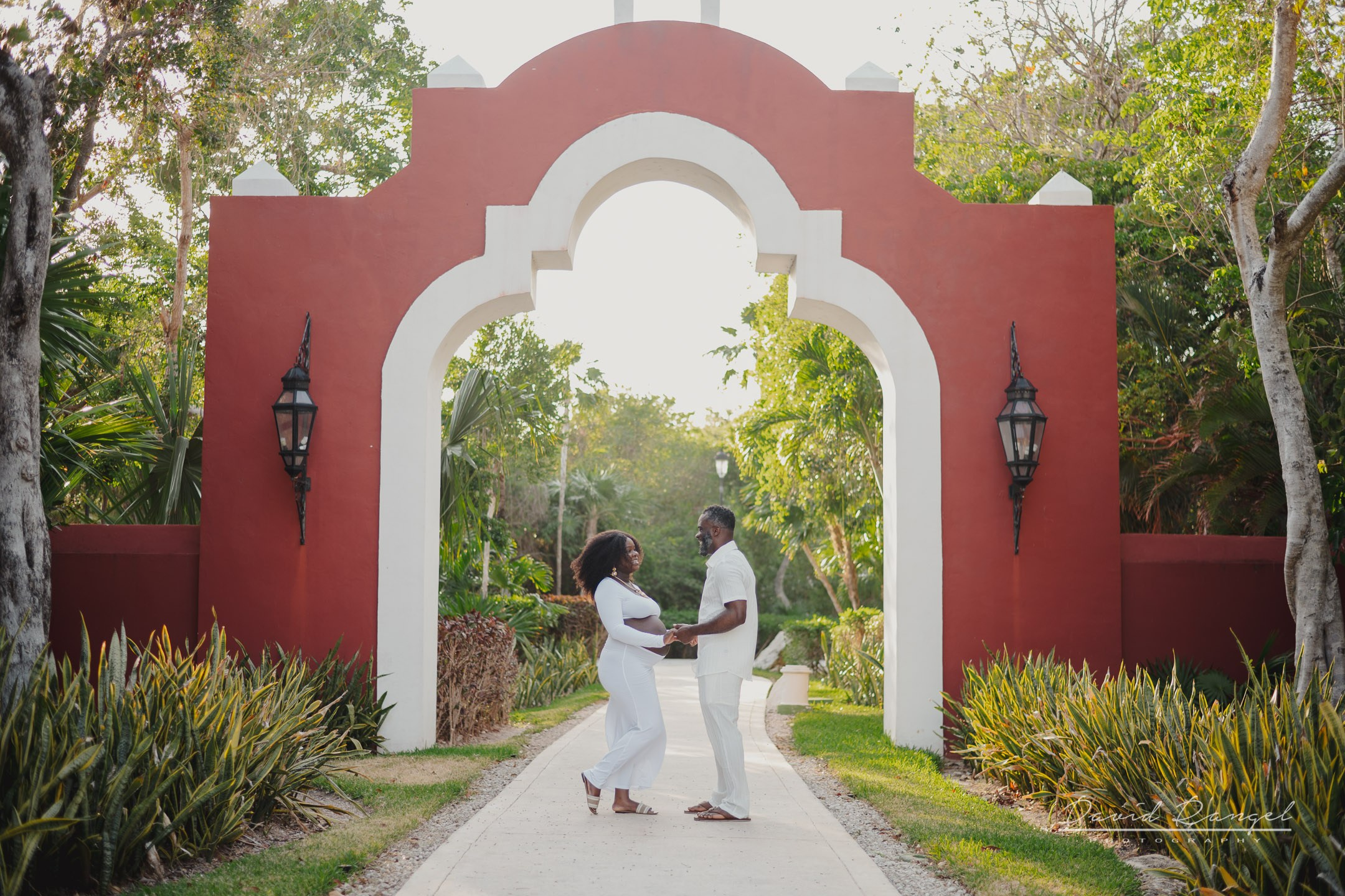 Maternity session of Ketsia & Ricketson at the beautiful colonial-style Valentin Imperial Maya Hotel. Destination wedding photographer based in Cancun and Riviera Maya with service worldwide