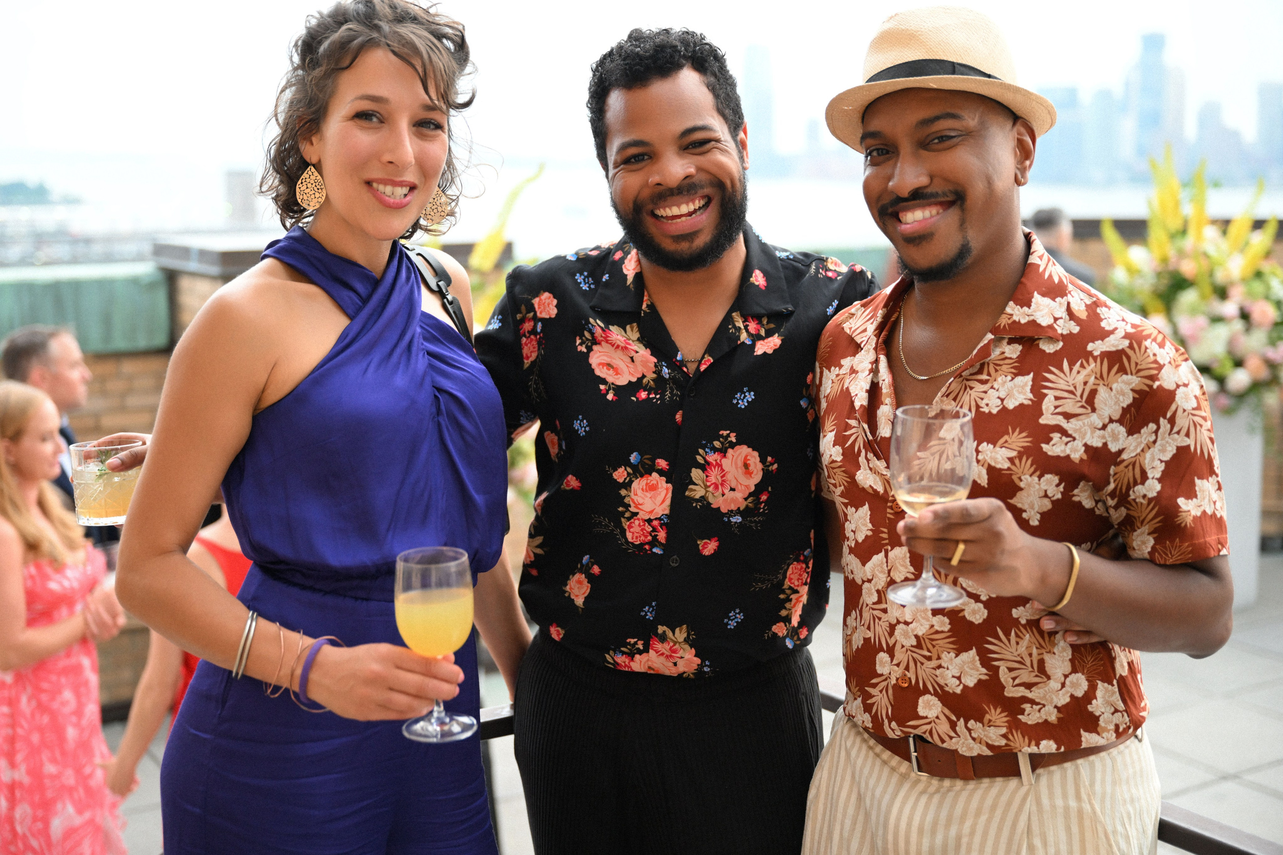 a man and woman standing next to each other people