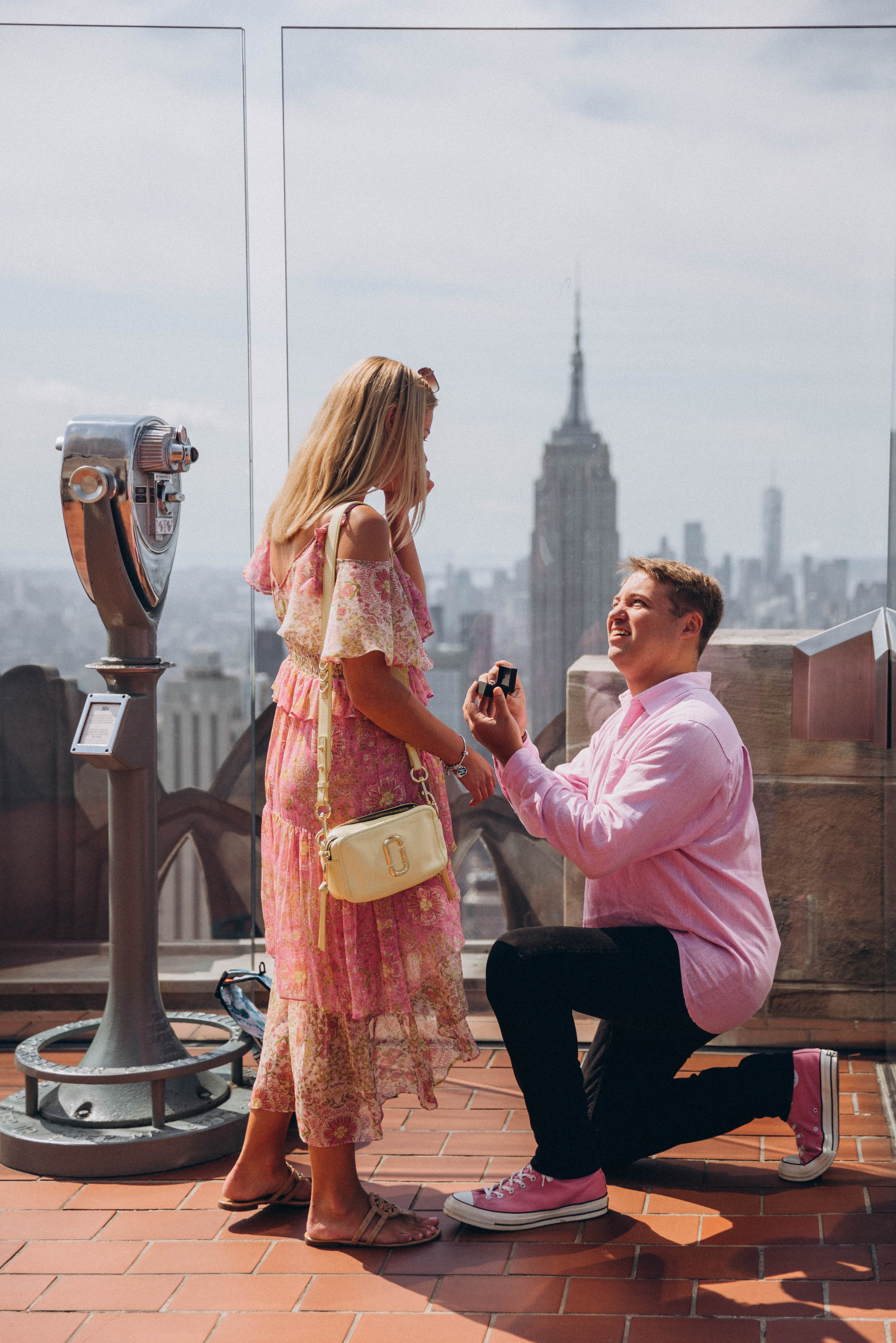 Surprise engagement in Central Park with violin player.