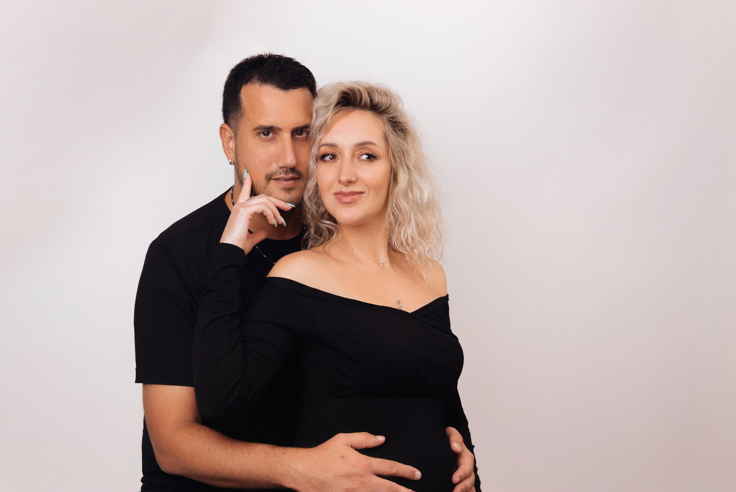 Studio pregnancy photoshooting for Alina and Michael. Home