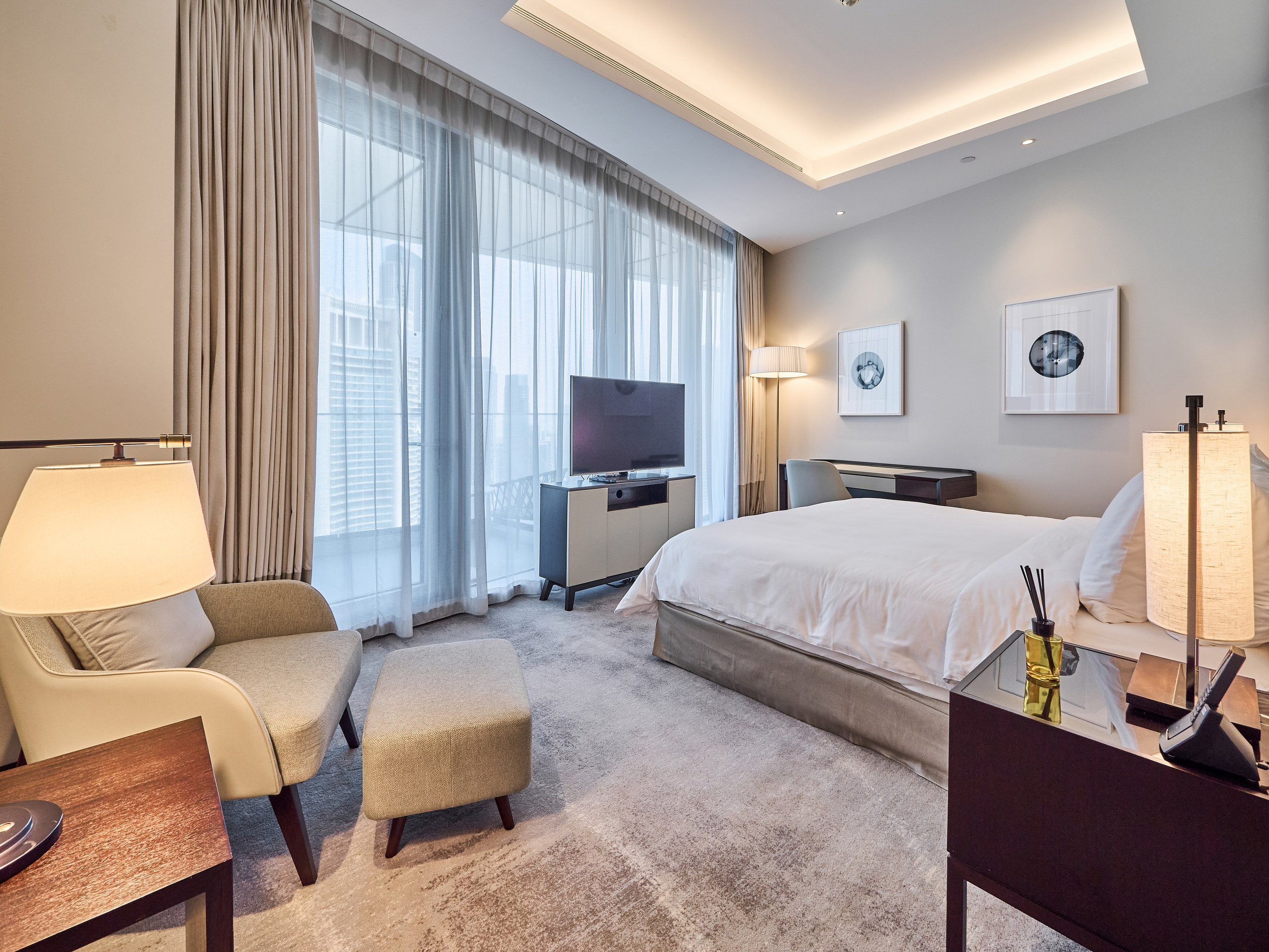 Spacious bedroom with balcony in luxury Dubai residence, perfect for Airbnb or Booking listings. Real estate and interior photography by Oleg Novikov.