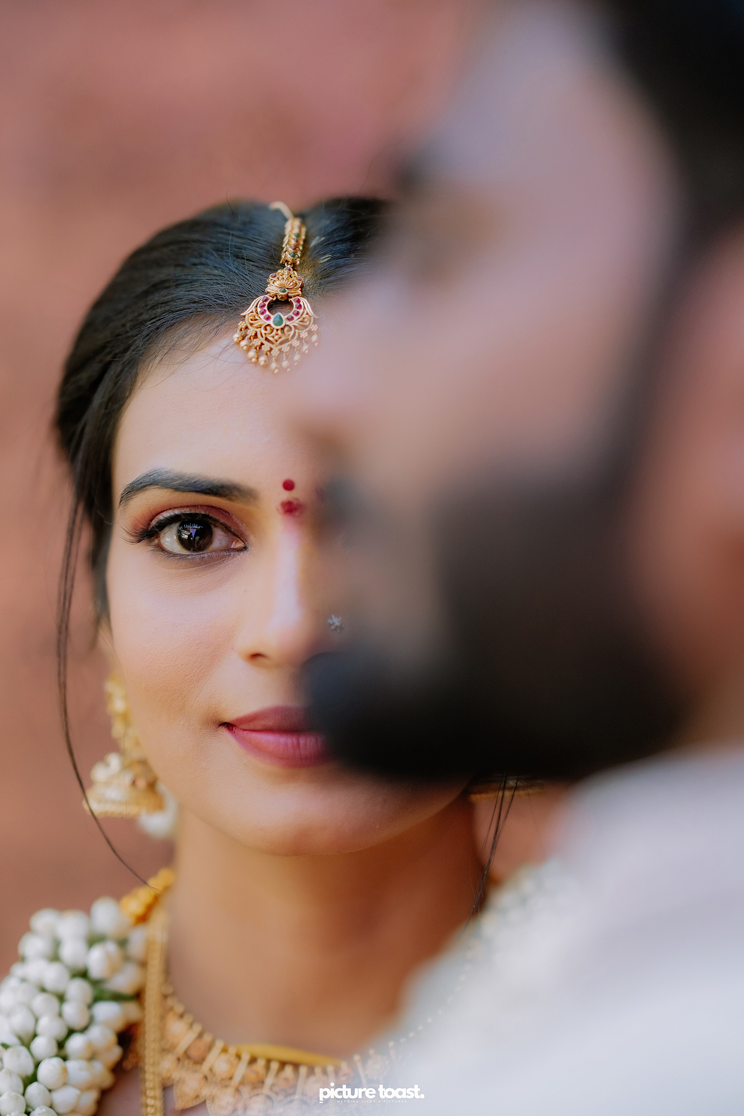 Wrapped in love and tradition. Fine art Wedding Photographers in India & Canada