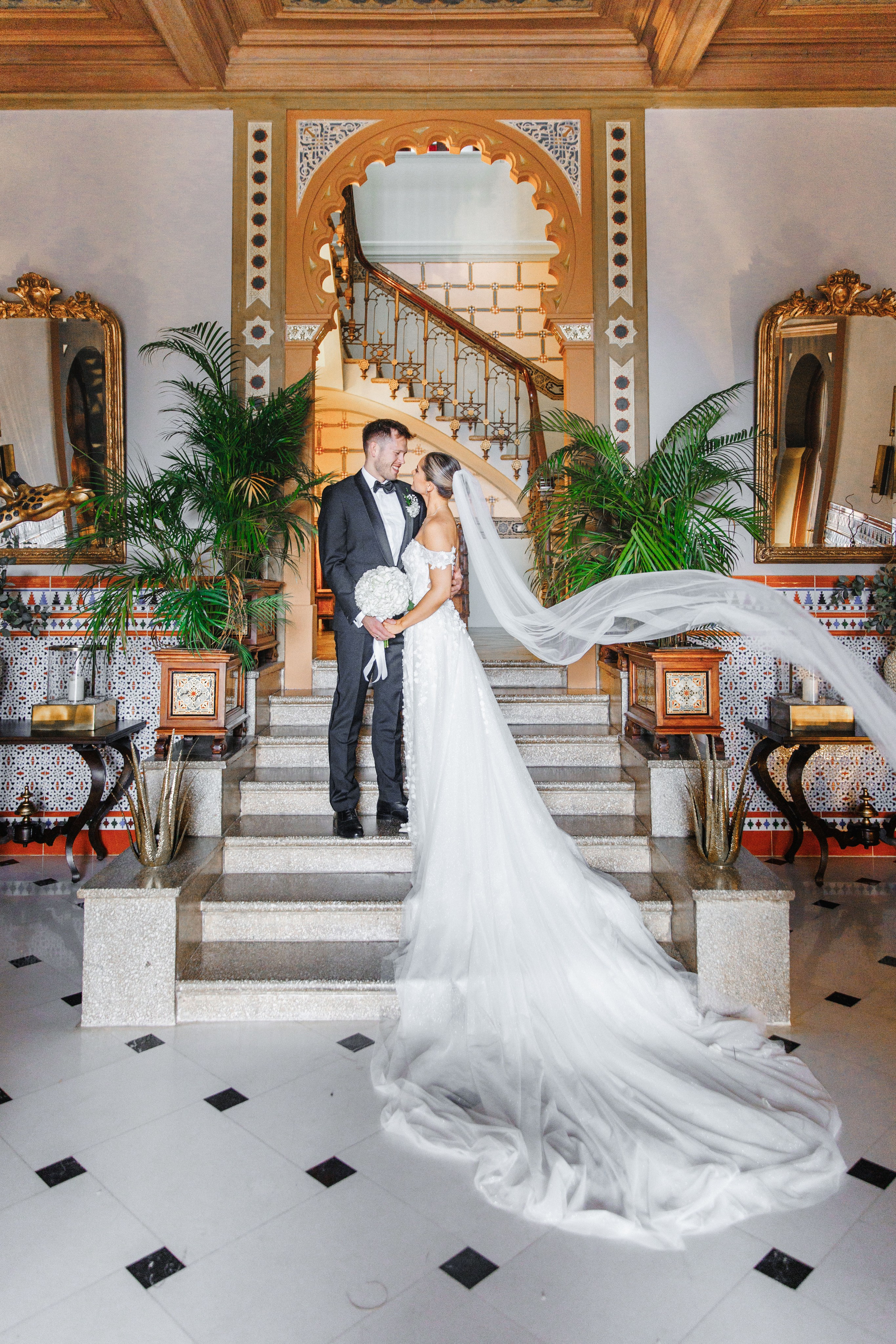 Portrait of the bride and groom showcasing the authentic wedding venue in Barcelona. 