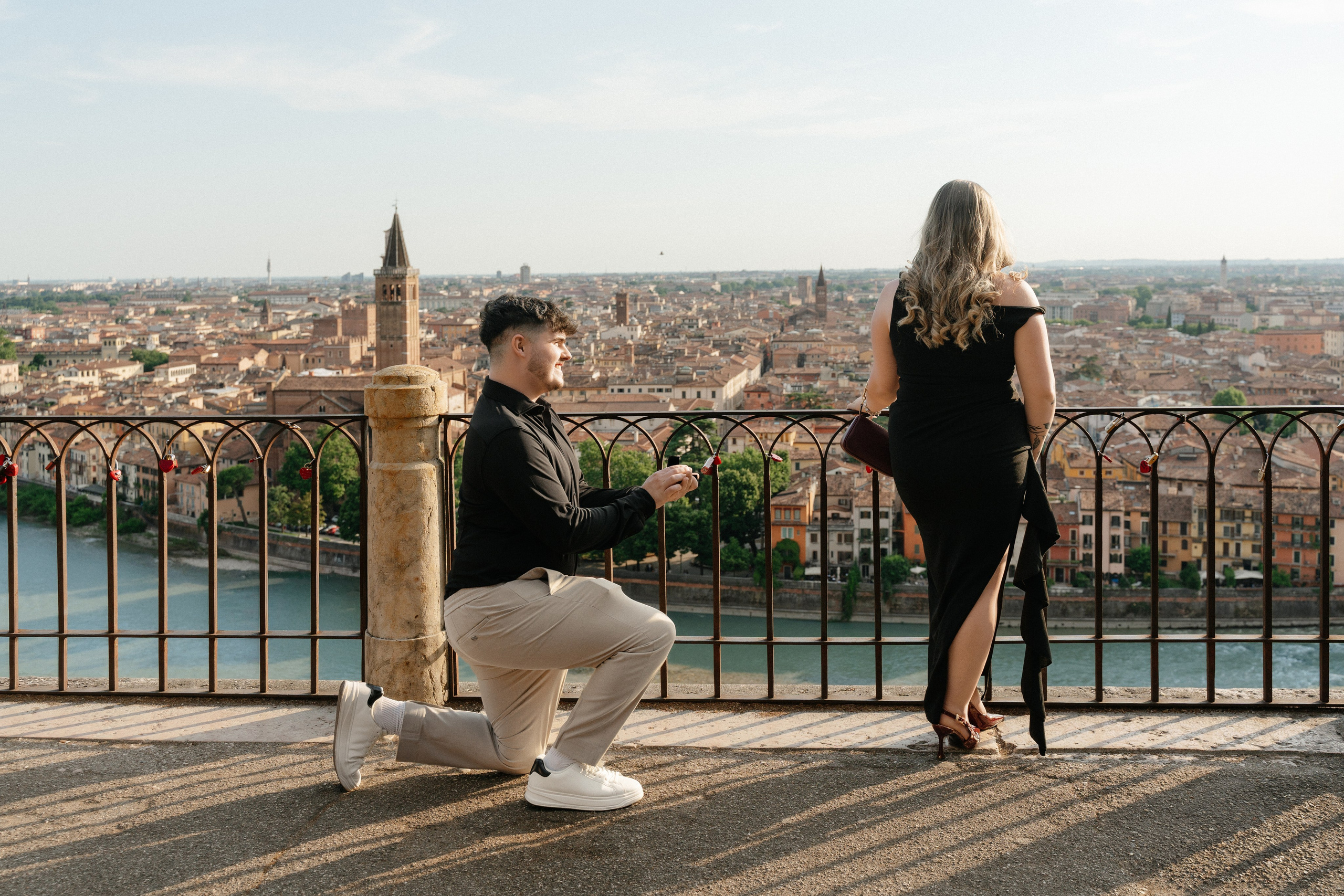 Man proposing to his partner at Castel San Pietro with panoramic views of Verona