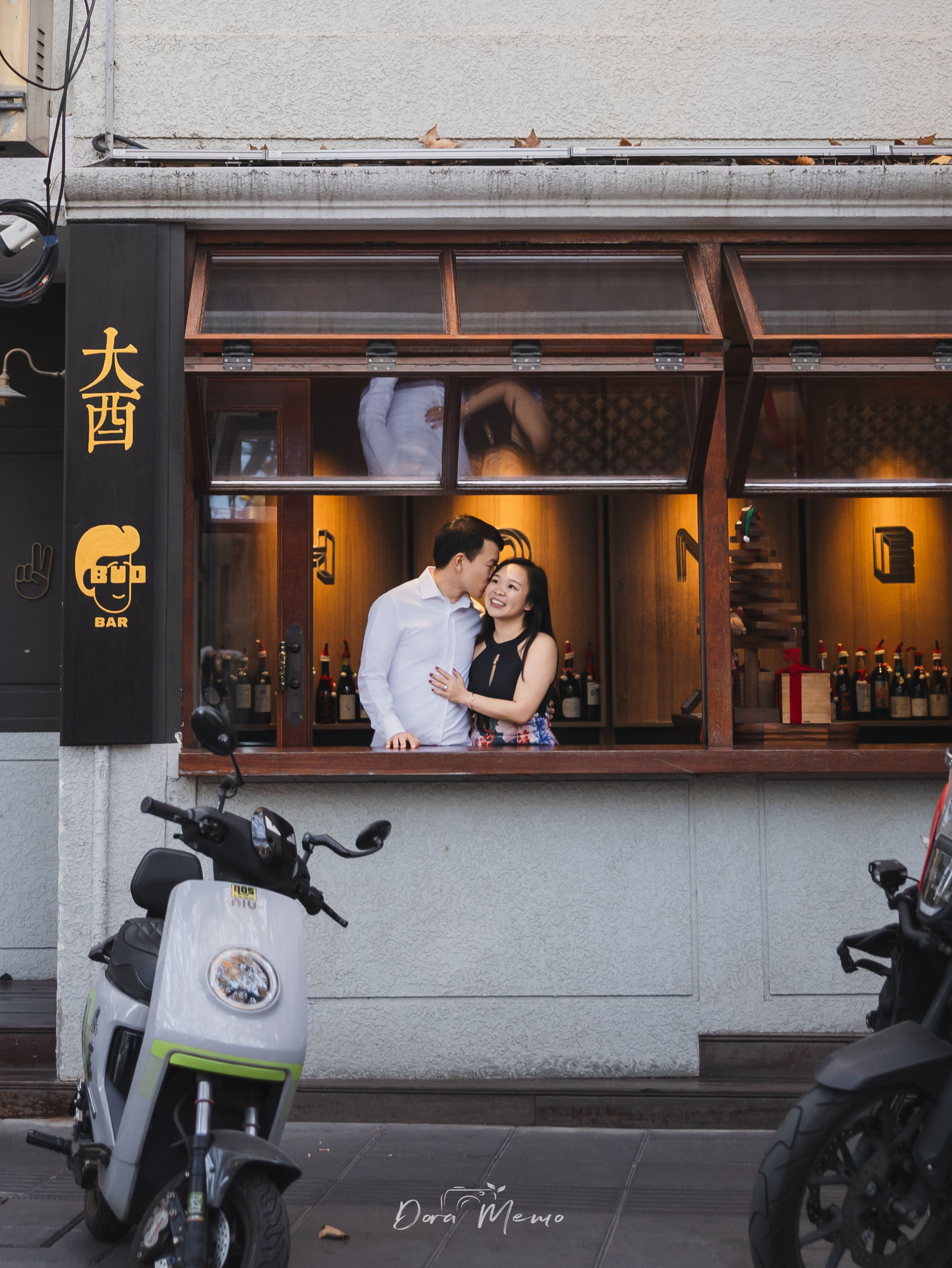 Intimate moment at a bar window, warm interior light, Wutong district