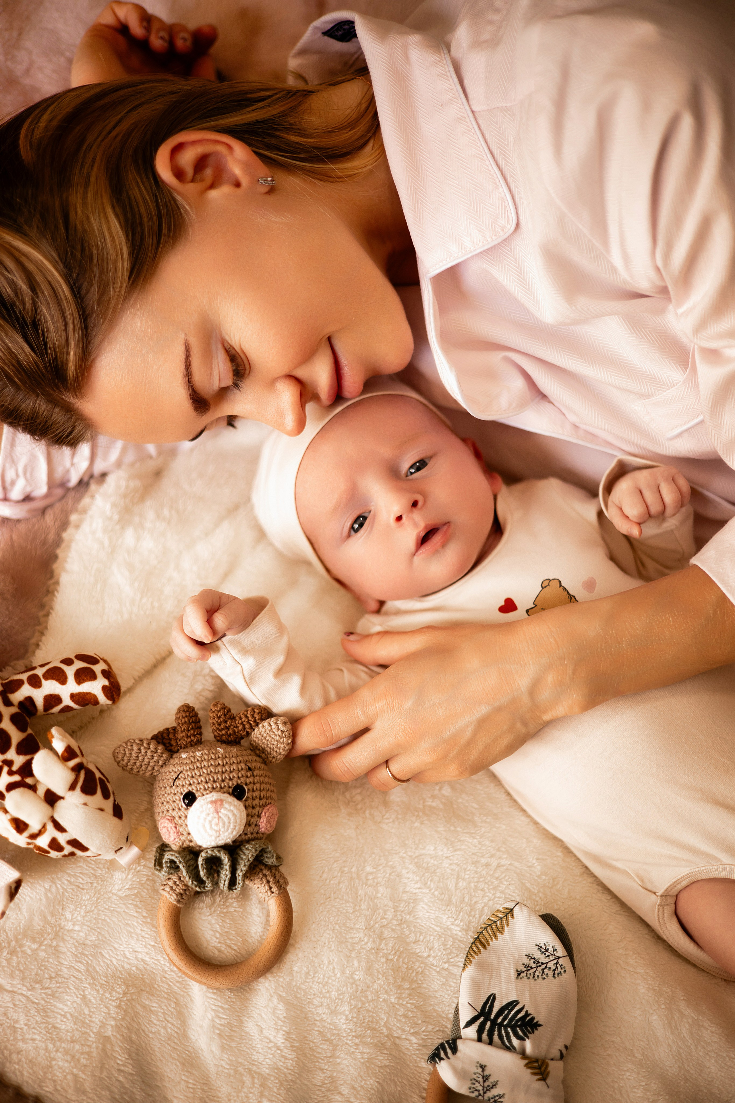 Tender moments with newborn and parents at home