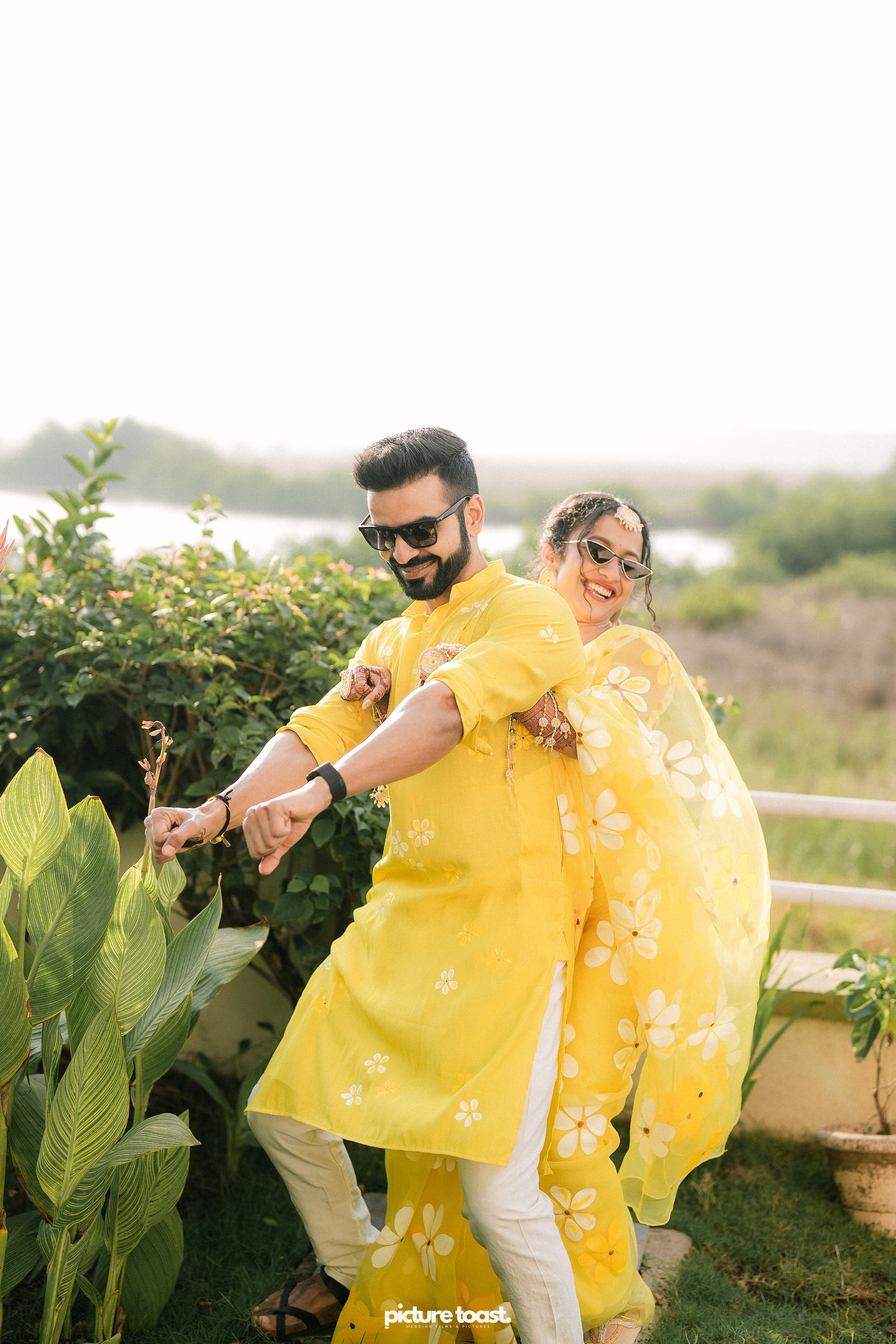 Haldi Hues Ft. Baebie & Goyal. Fine art Wedding Photographers in India & Canada