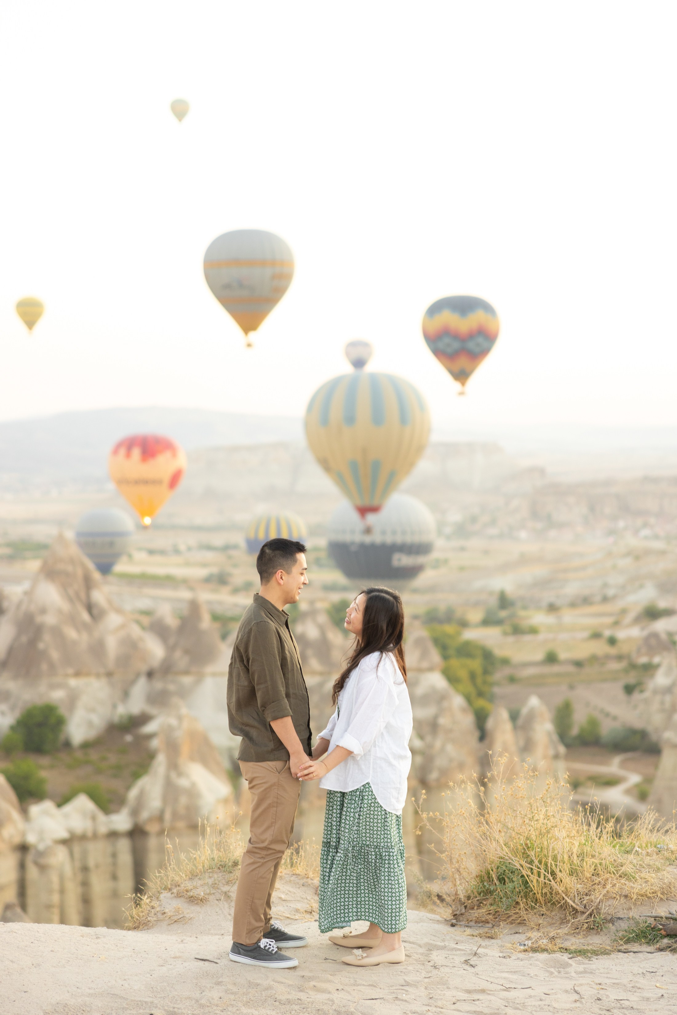 Romantic Love Story Photoshoot with Hot Air Balloons in Cappadocia. Julia Ganch I Fashion Wedding Photography I Cappadocia Turkey