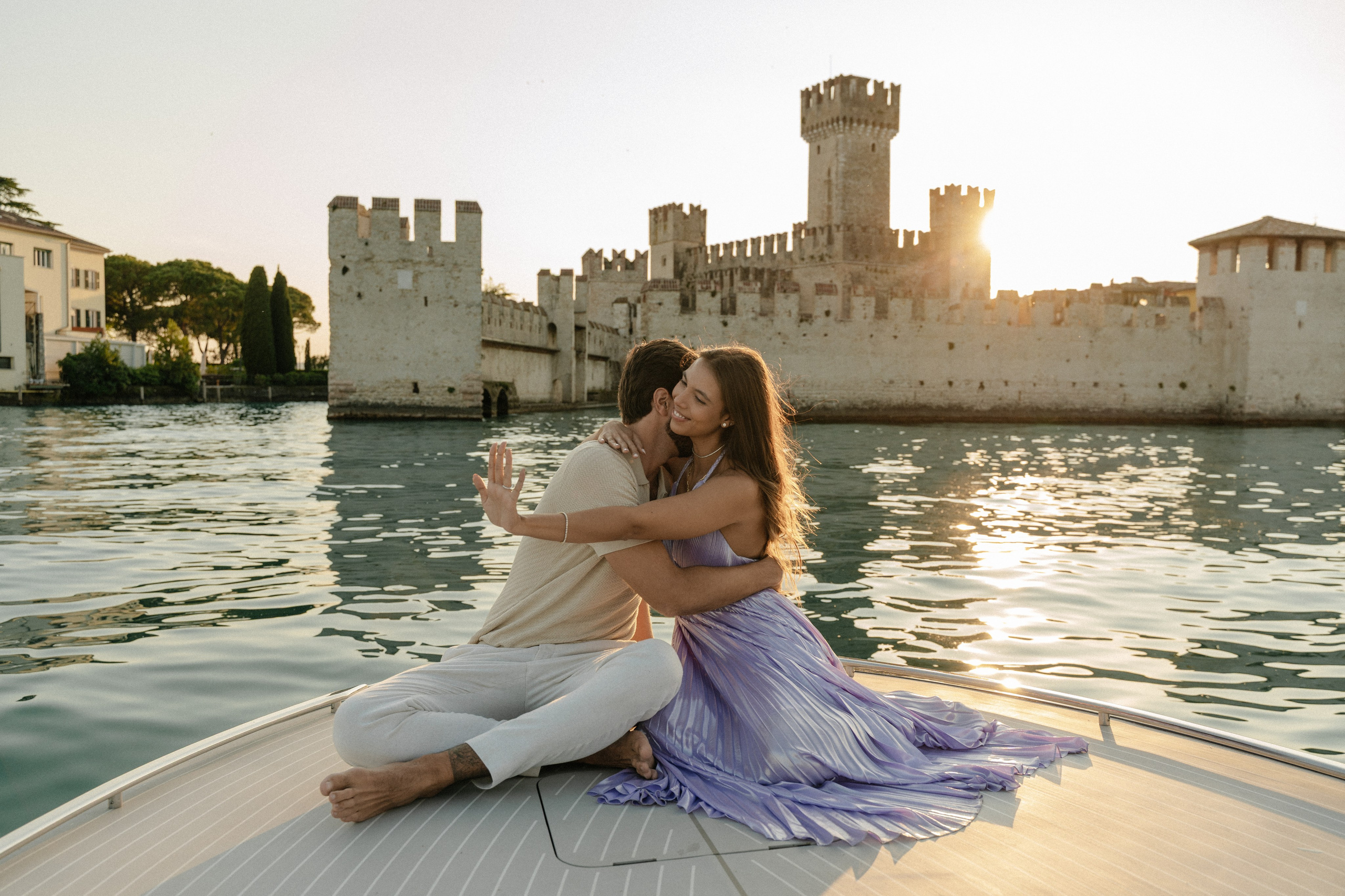 Surprise marriage proposal overlooking Lake Garda and Sirmione Castle 