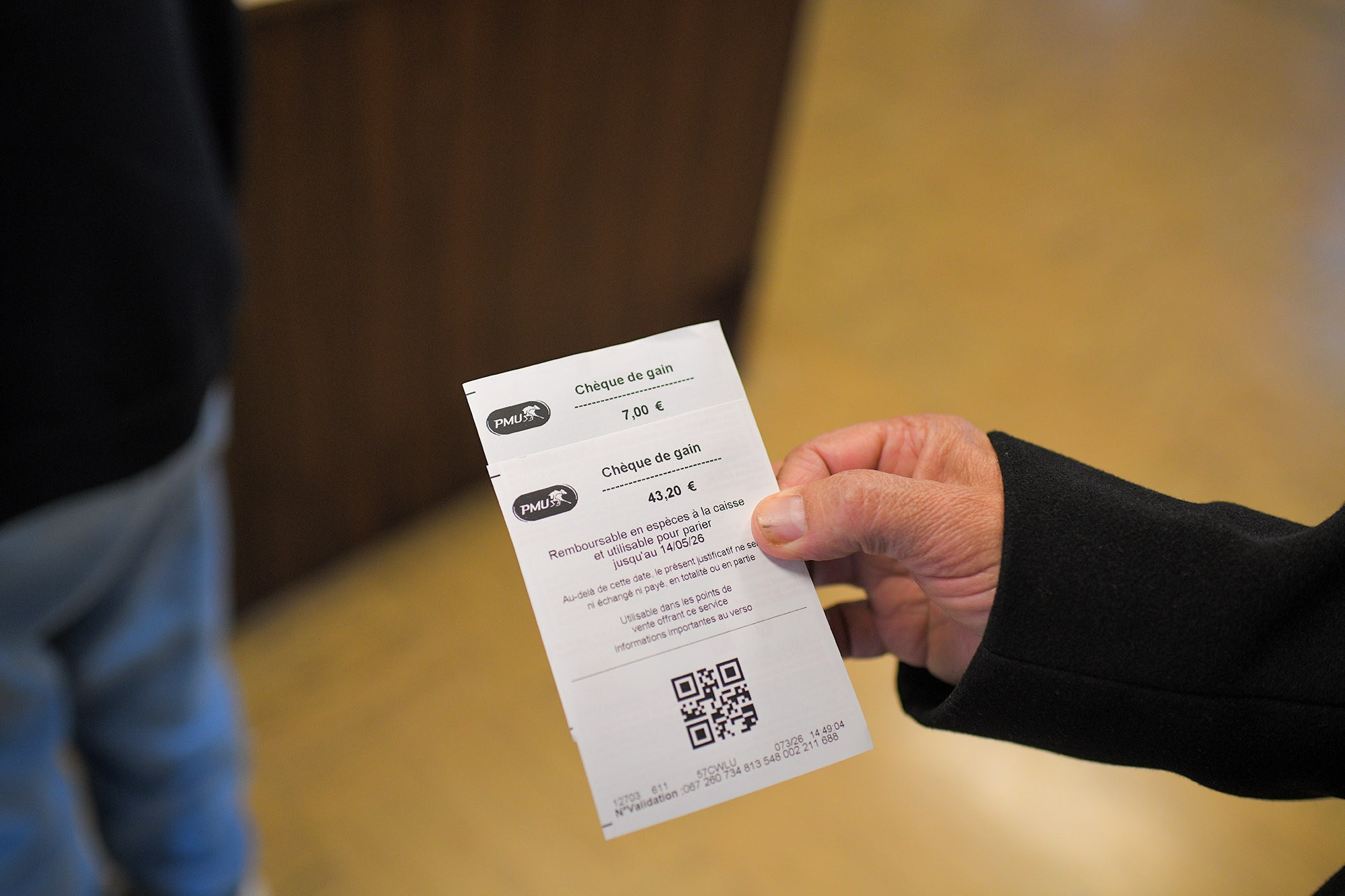 Winning PMU horse racing ticket at Hippodrome d’Auteuil in Paris