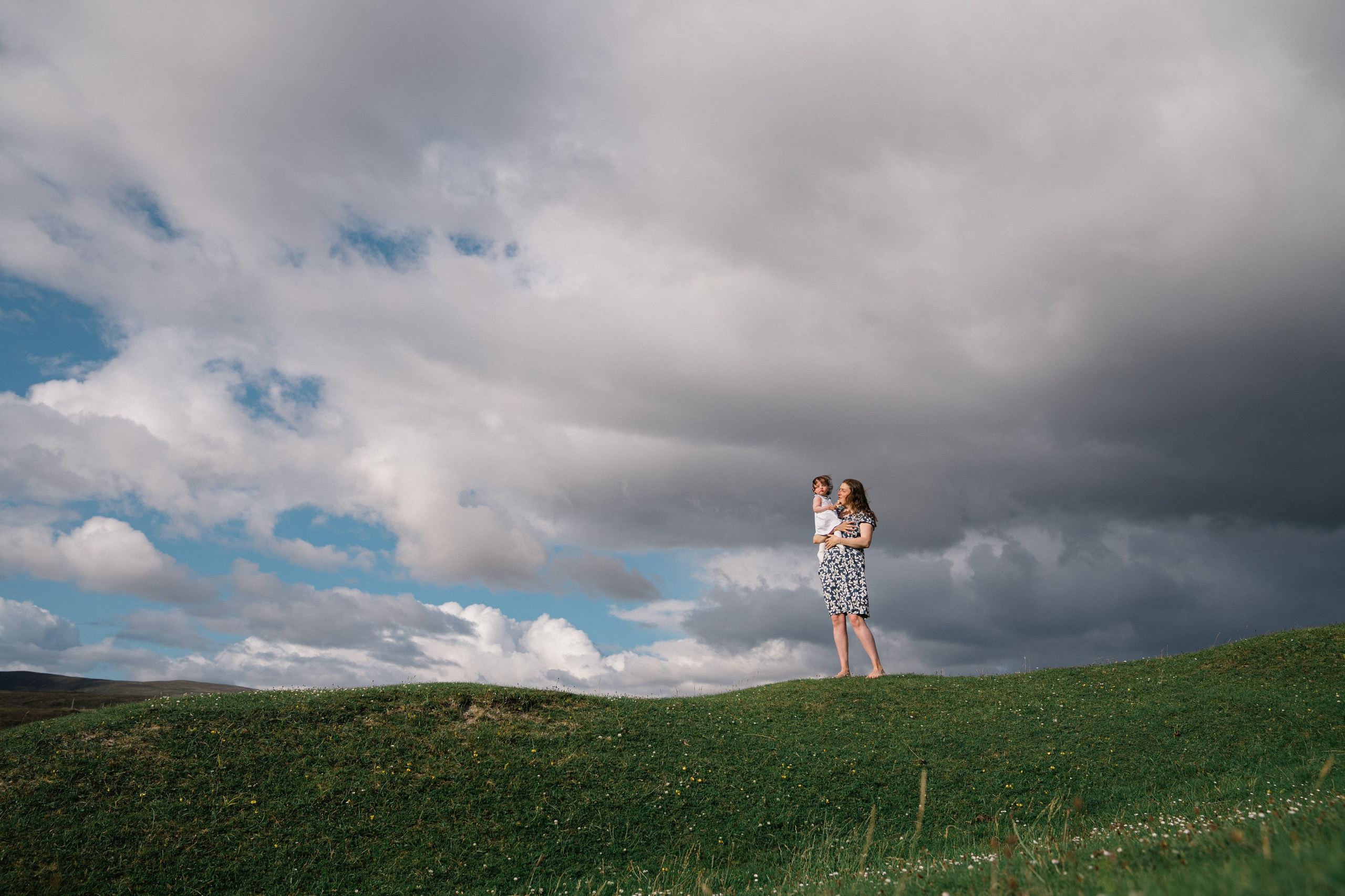 Darya and Mia at the ocean. Wedding and family photographer Ireland