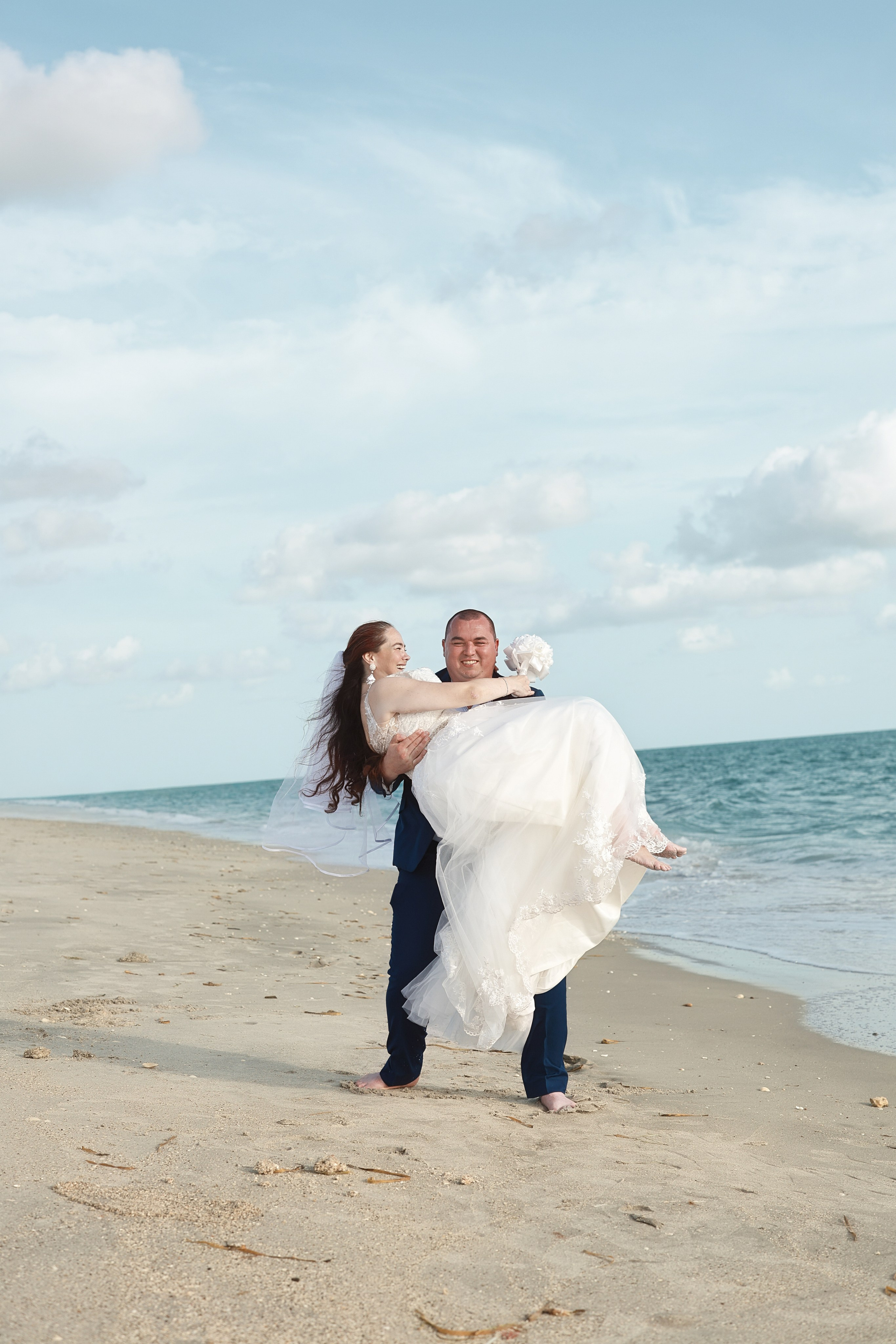 Beach Wedding in Englewood, Florida. Wedding and family photographer Olga Belianskaia