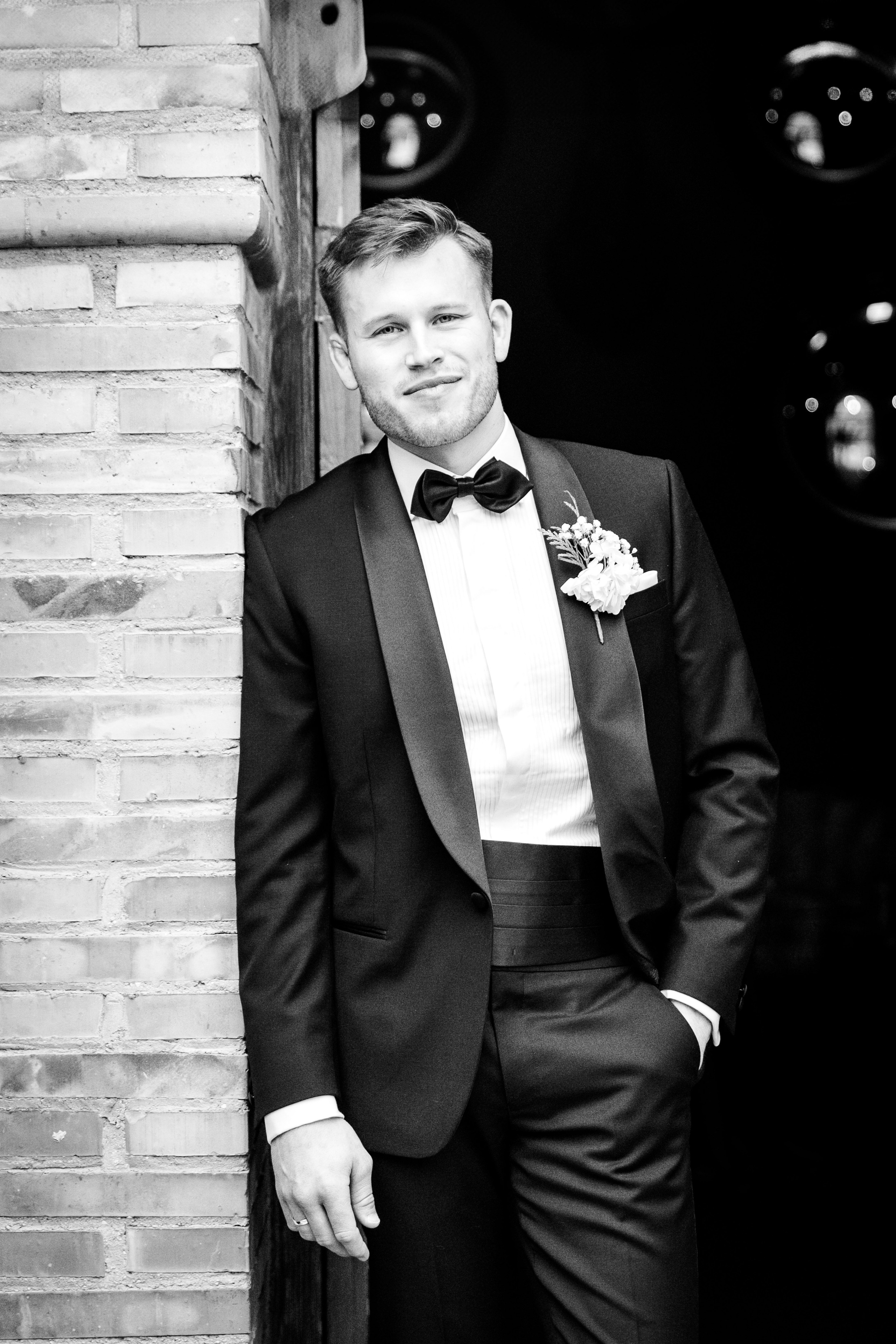 Natural light portrait of the groom smiling warmly, emphasizing his joy on the wedding day in Barcelona.