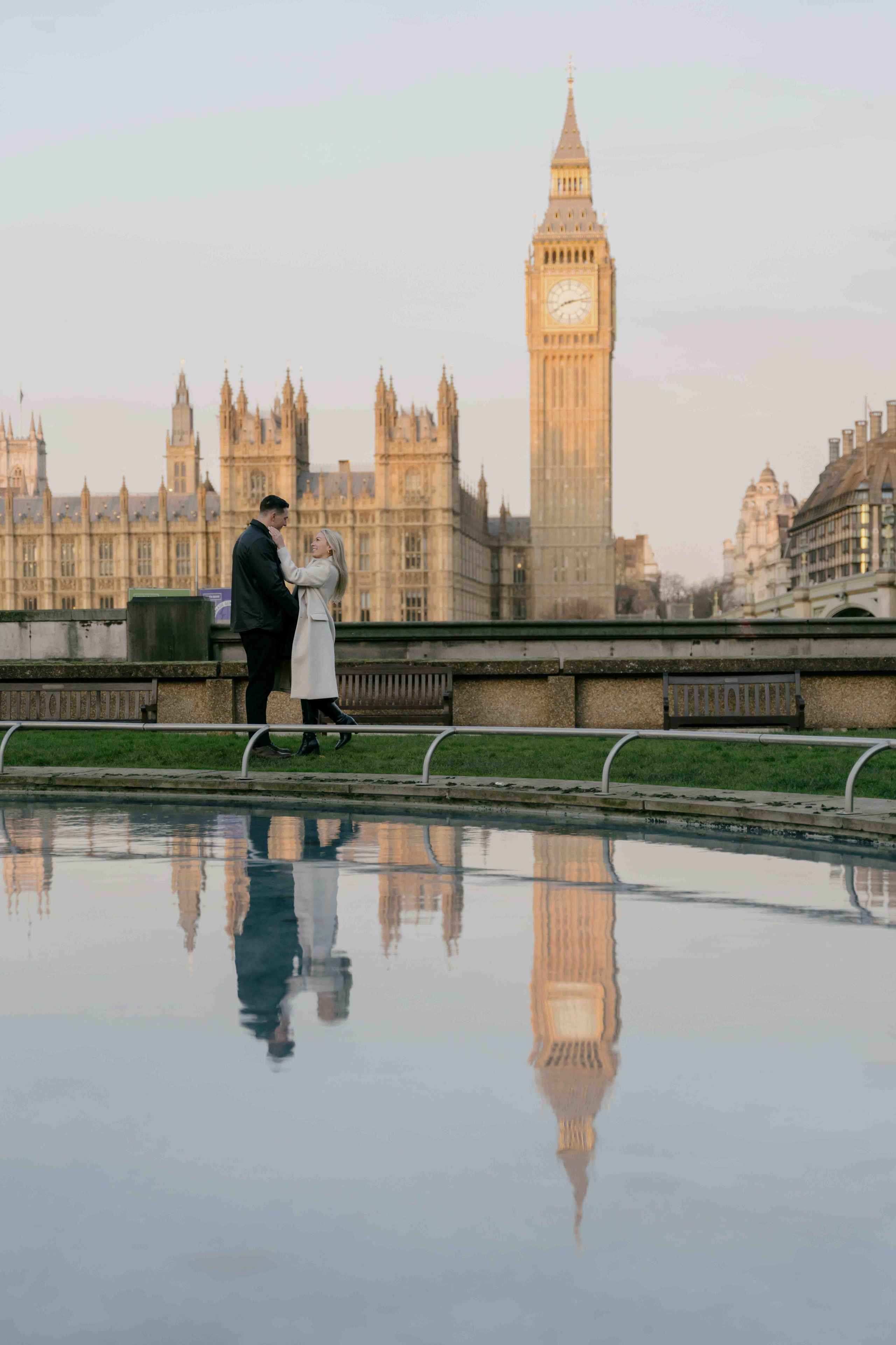 Big Ben and Westminster reflection in water at sunrise London