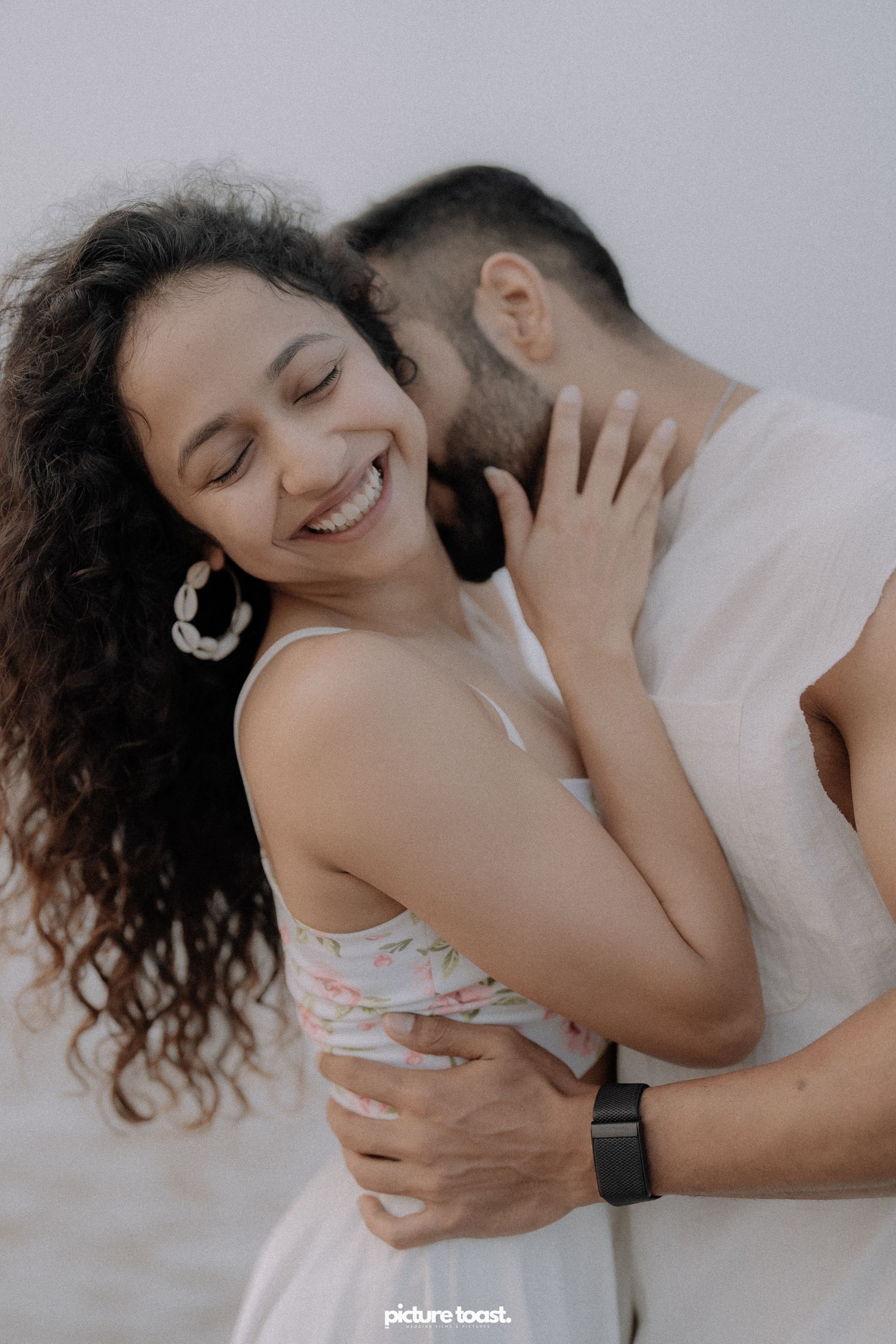 Love In The Beach. Fine art Wedding Photographers in India & Canada