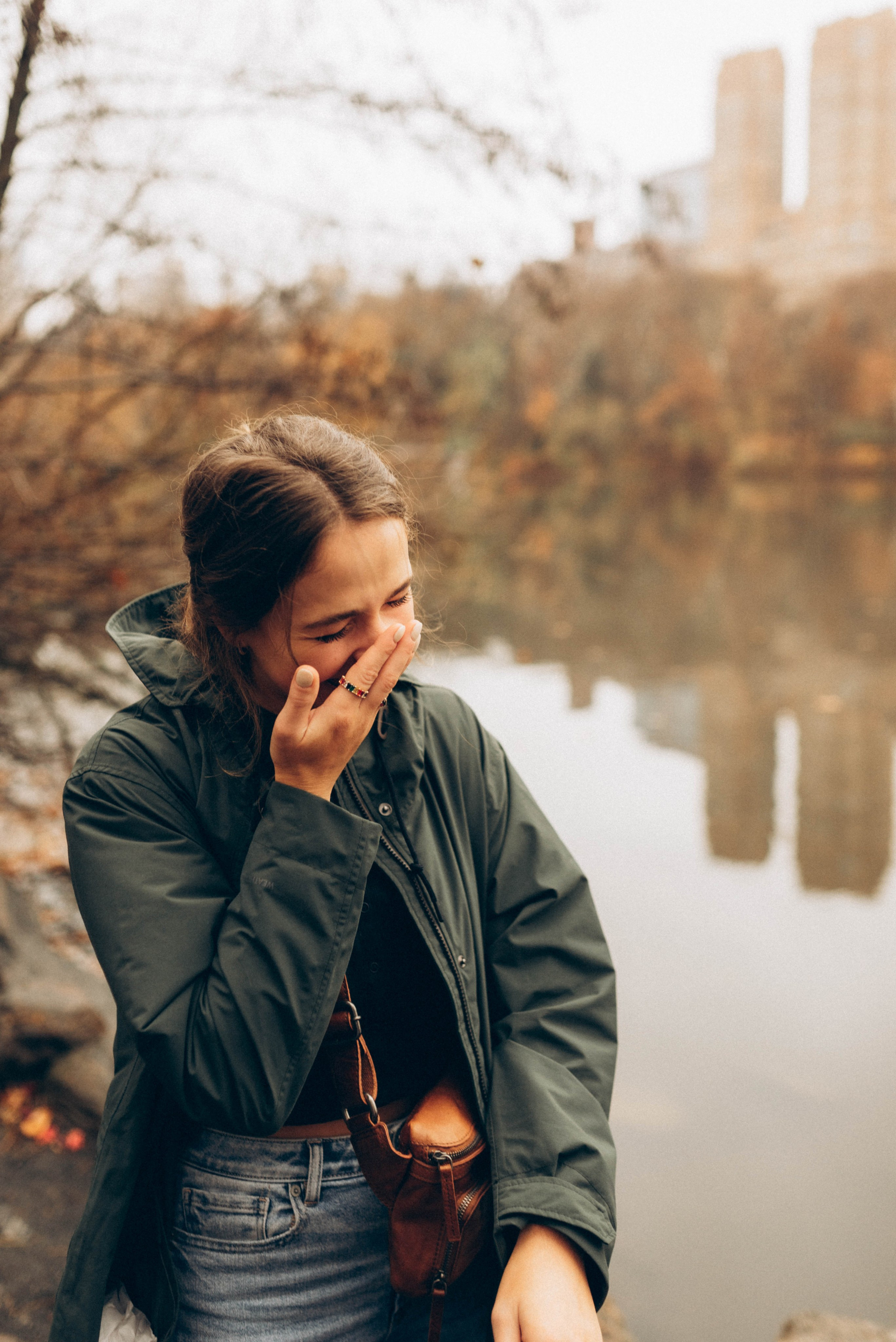 Surprise proposal under cherry blossoms in Central Park.