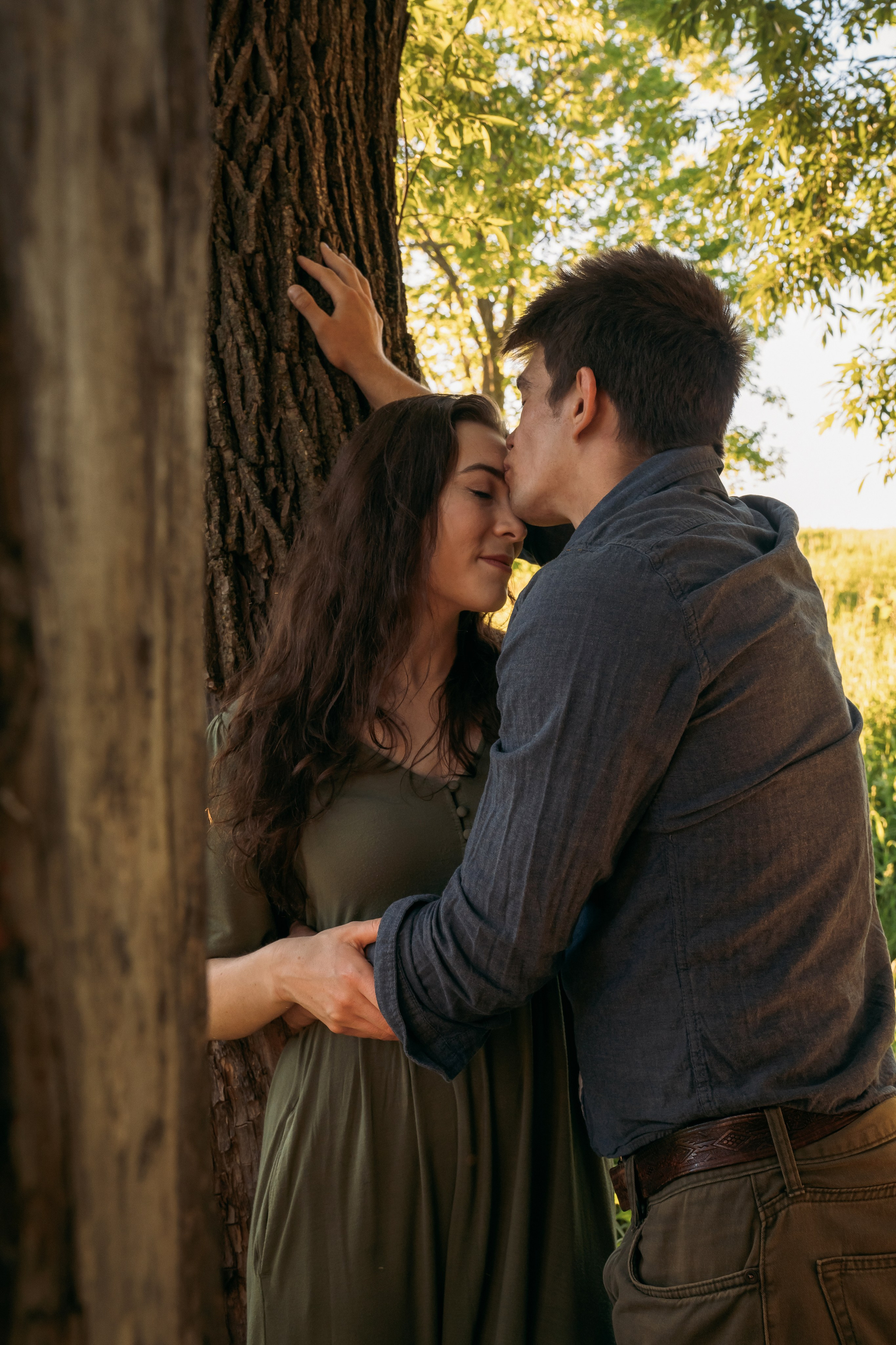 Couple walking side by side in autumn woods