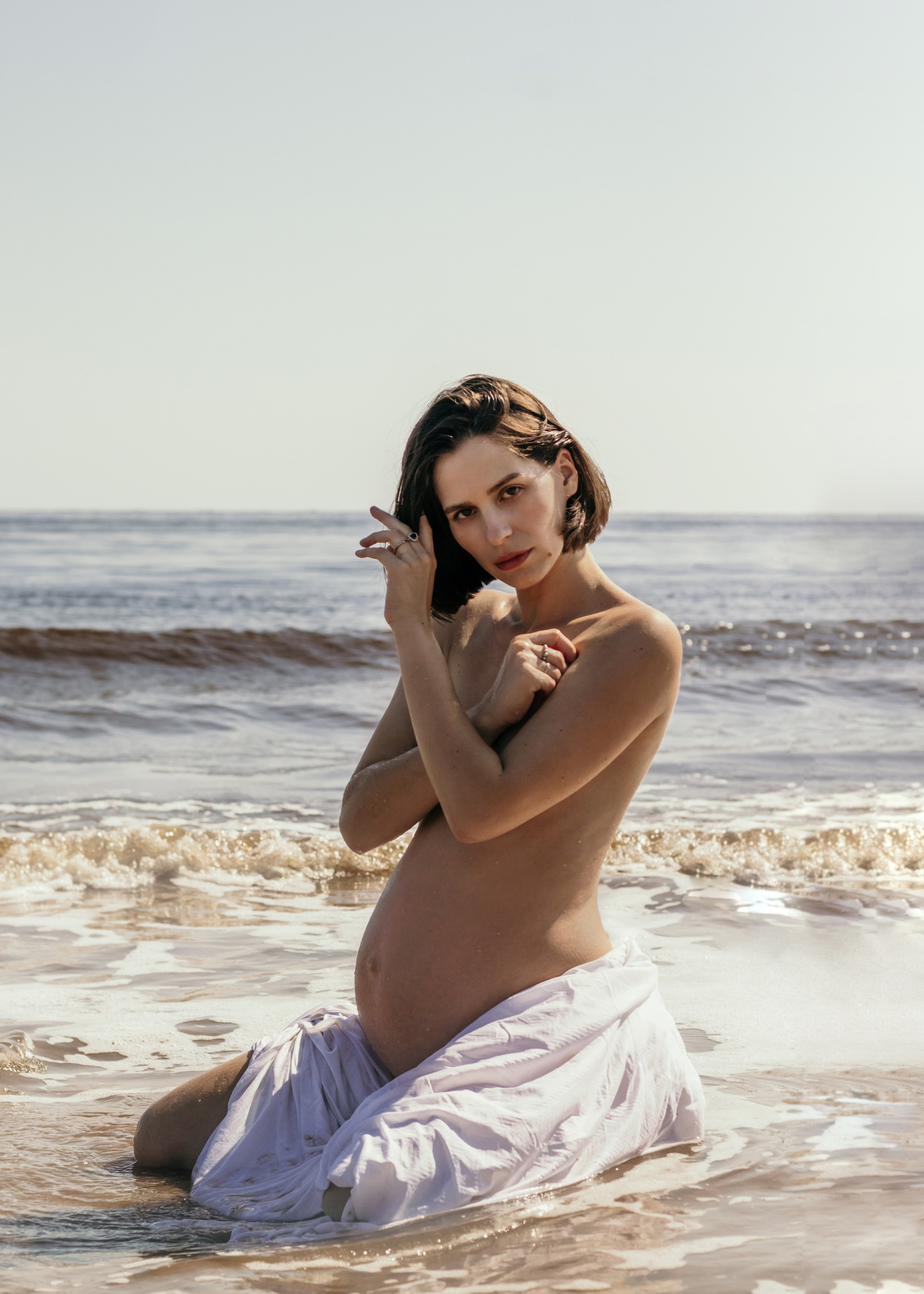 Maternity photoshoot at the beach. Portrait and couples photographer in Florida, Valeriia Honcharova