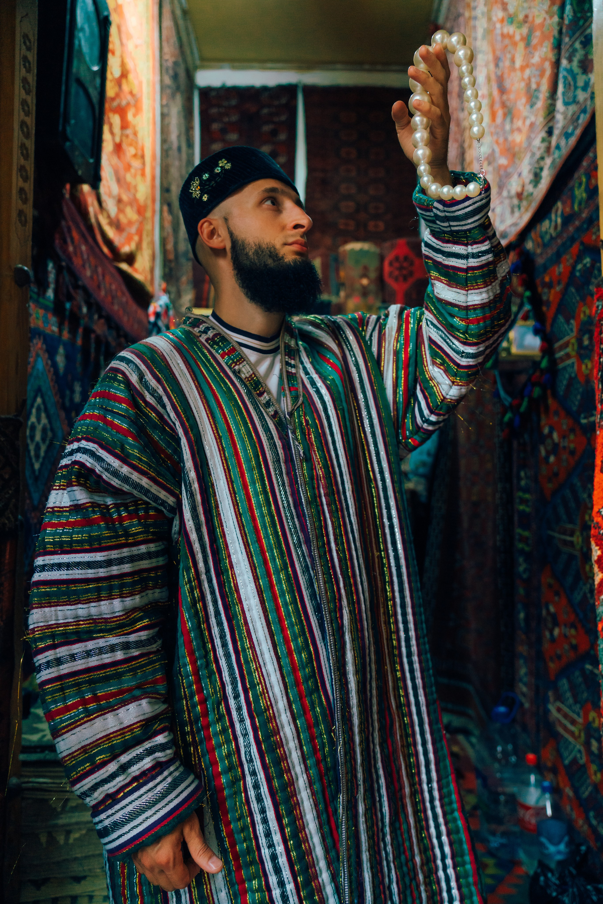 Men's photoshoot in national Uzbek costume in Bukhara