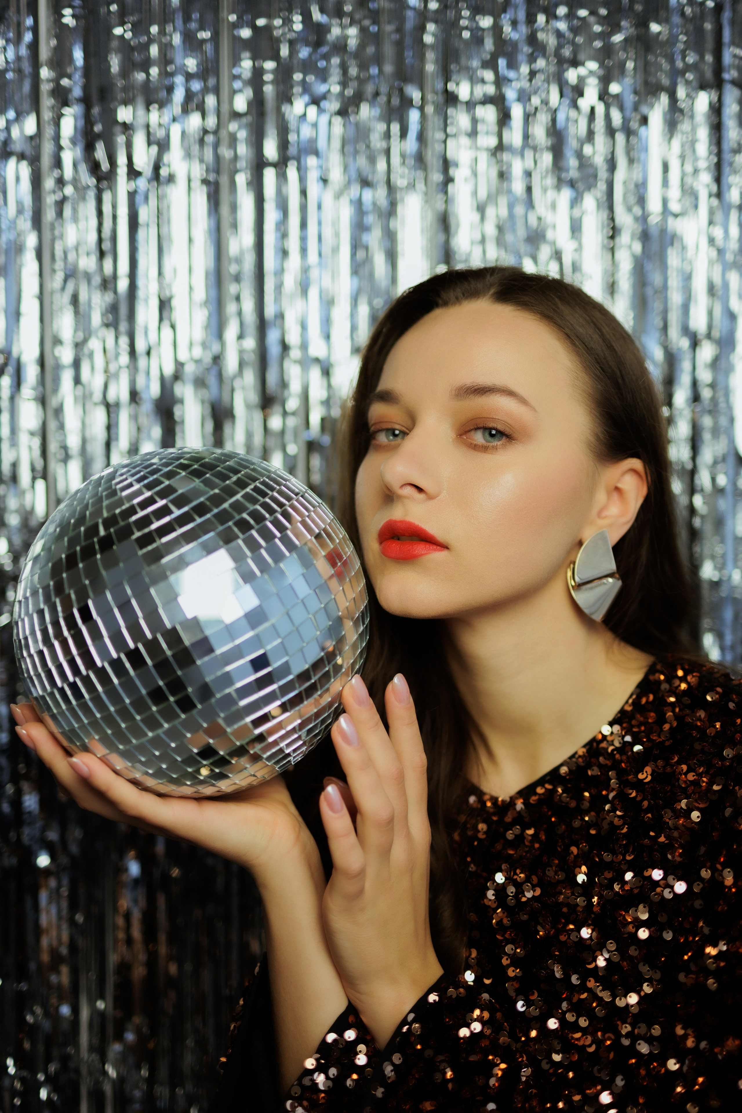Glamorous Studio Photoshoot. Woman in Black Sequin Dress with Disco Ball. Kristina Kozheltsova- Soulful Portrait&Lifestyle&Love Story Photographer in Leipzig, Germany