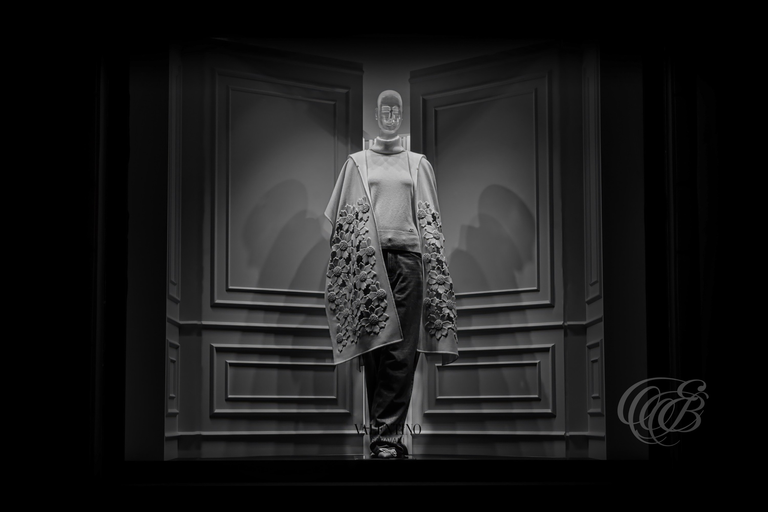 Rome Italy – Valentino Boutique - Window Display B&W – Eduardo Bartoli Fine Art Photography - Black and white fine art photograph of a softly lit mannequin in the Valentino boutique window display in Rome, Italy – photography by Eduardo Bartoli.