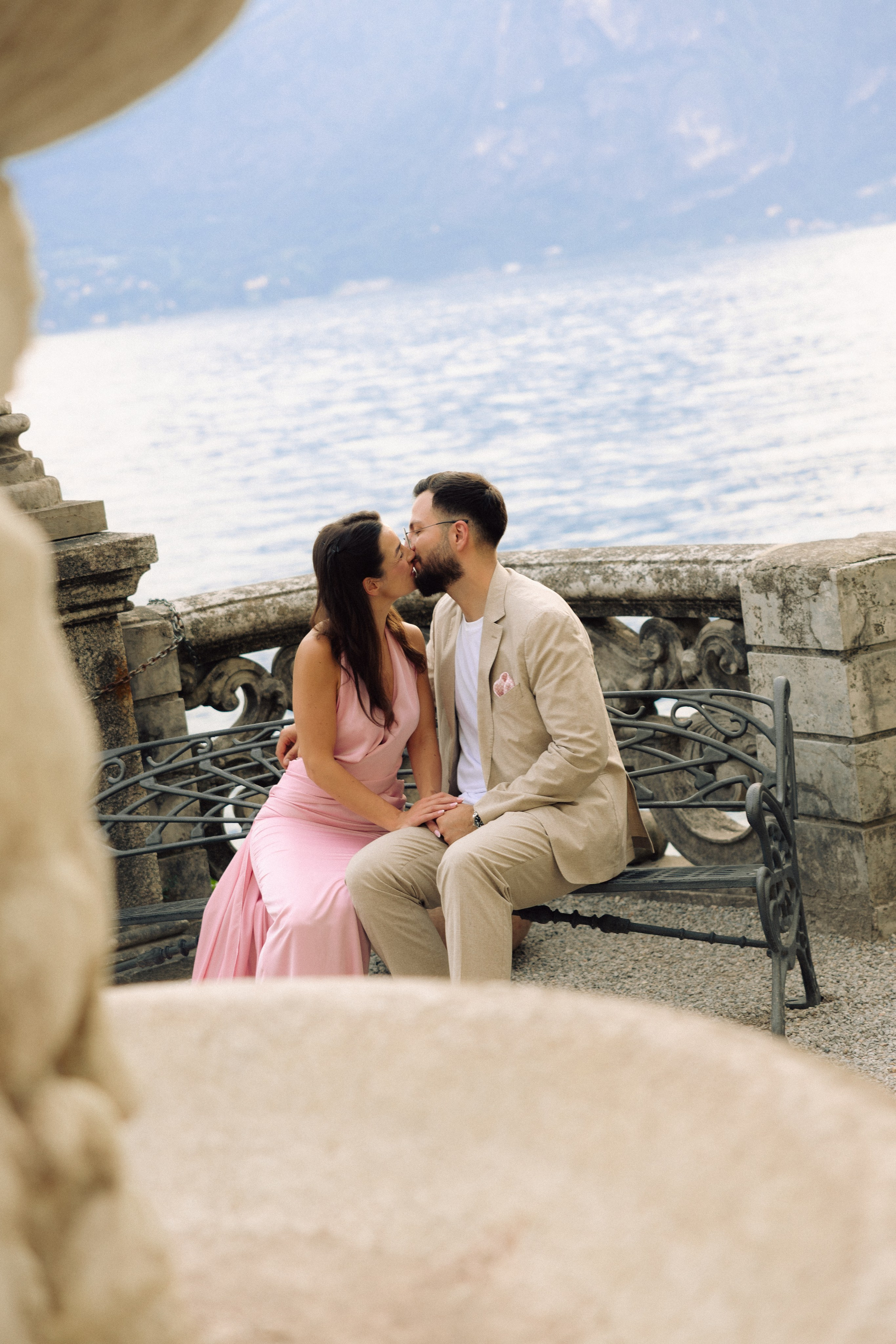 Couple embracing near Villa Monastero overlooking Lake Como