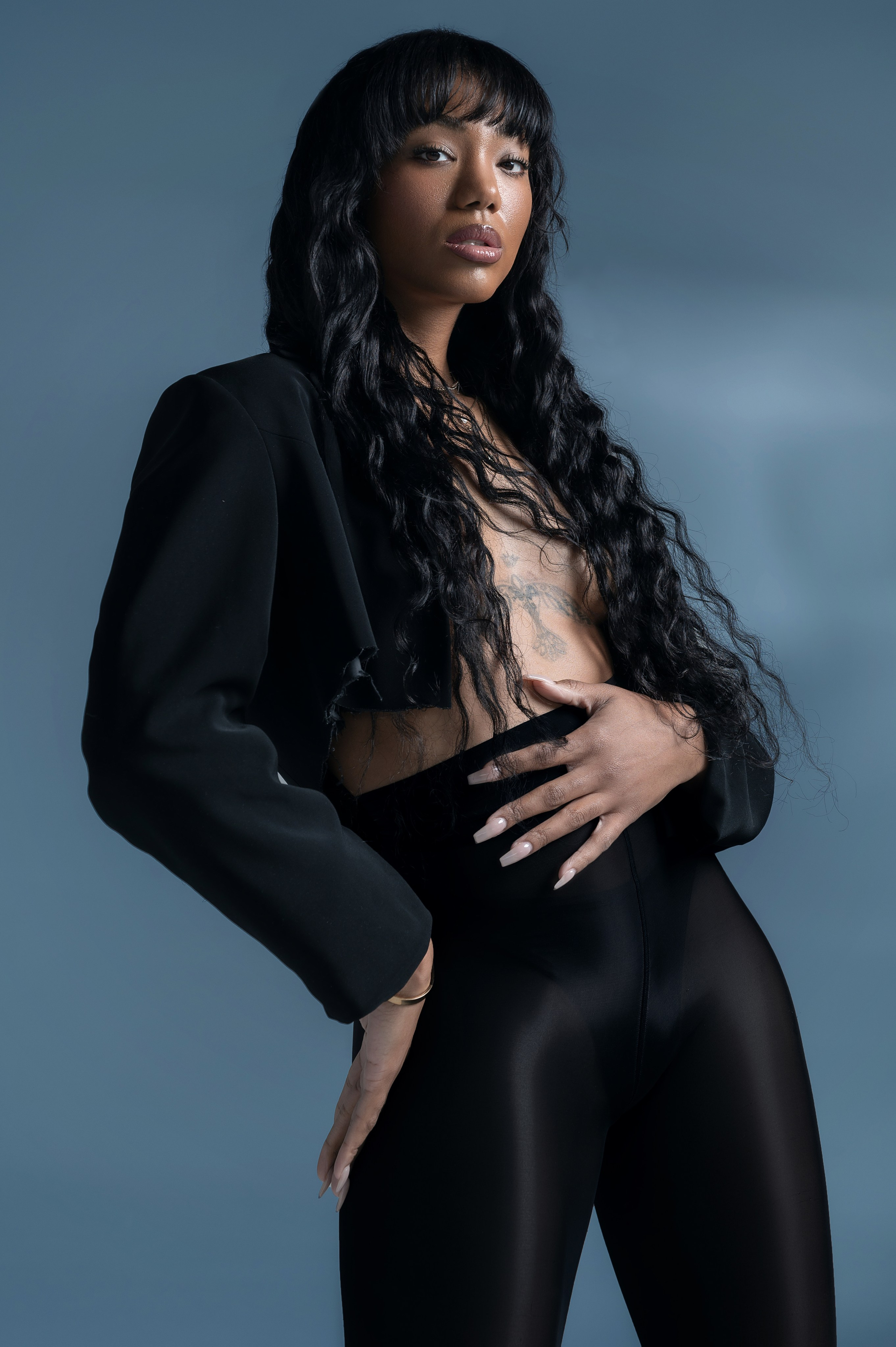 Fashion portrait in studio with hard light, model test for professional portfolio in San Francisco.