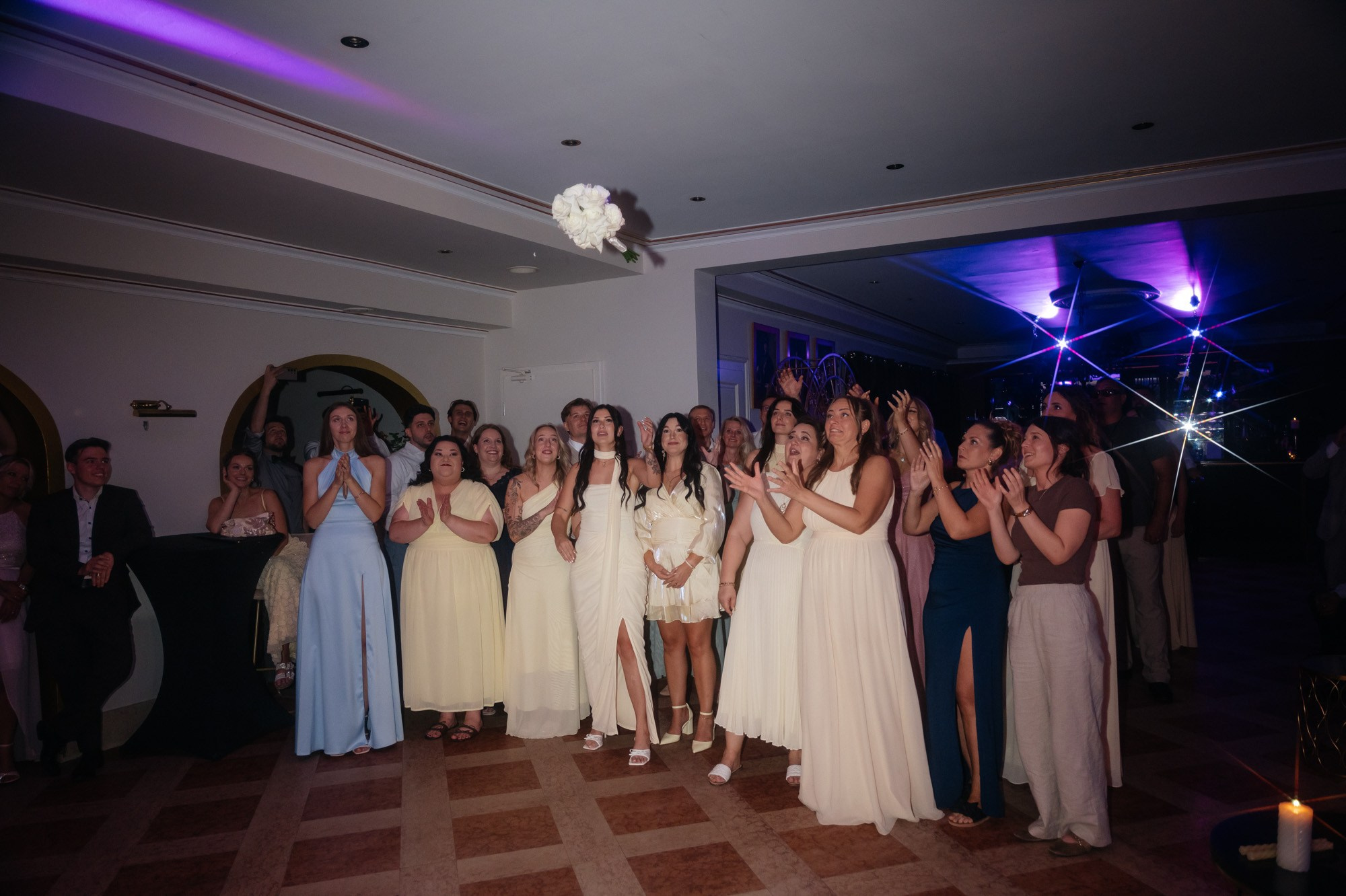 Friends waiting for the bouquet toss