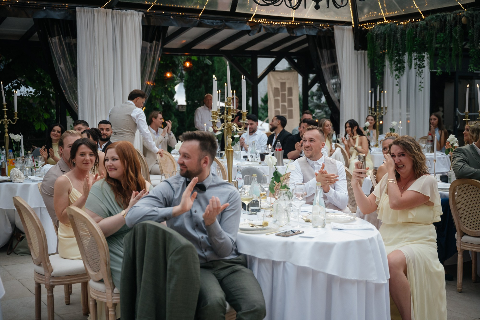 Guests laughing during the speech
