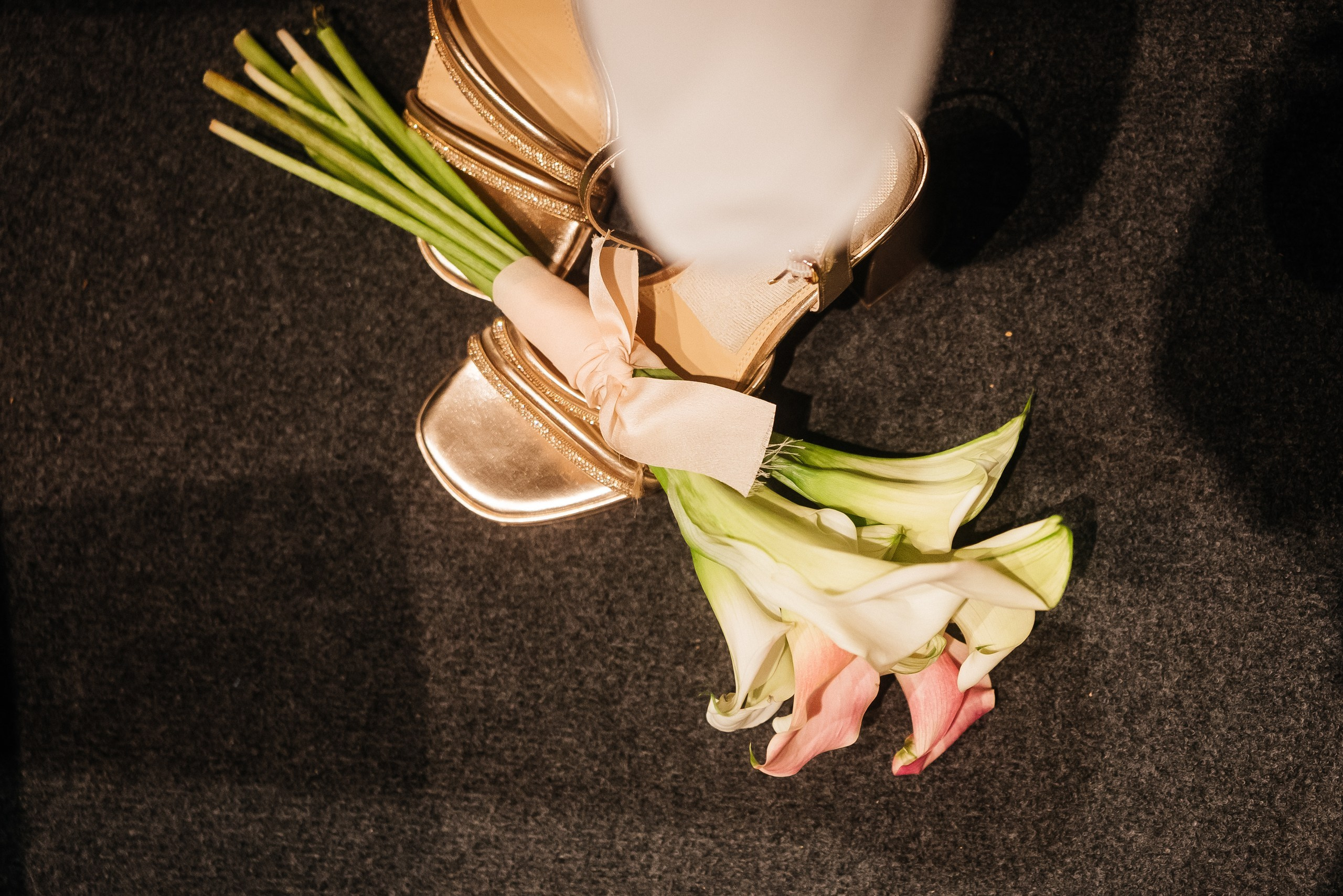 idal bouquet and the couple's hands held together