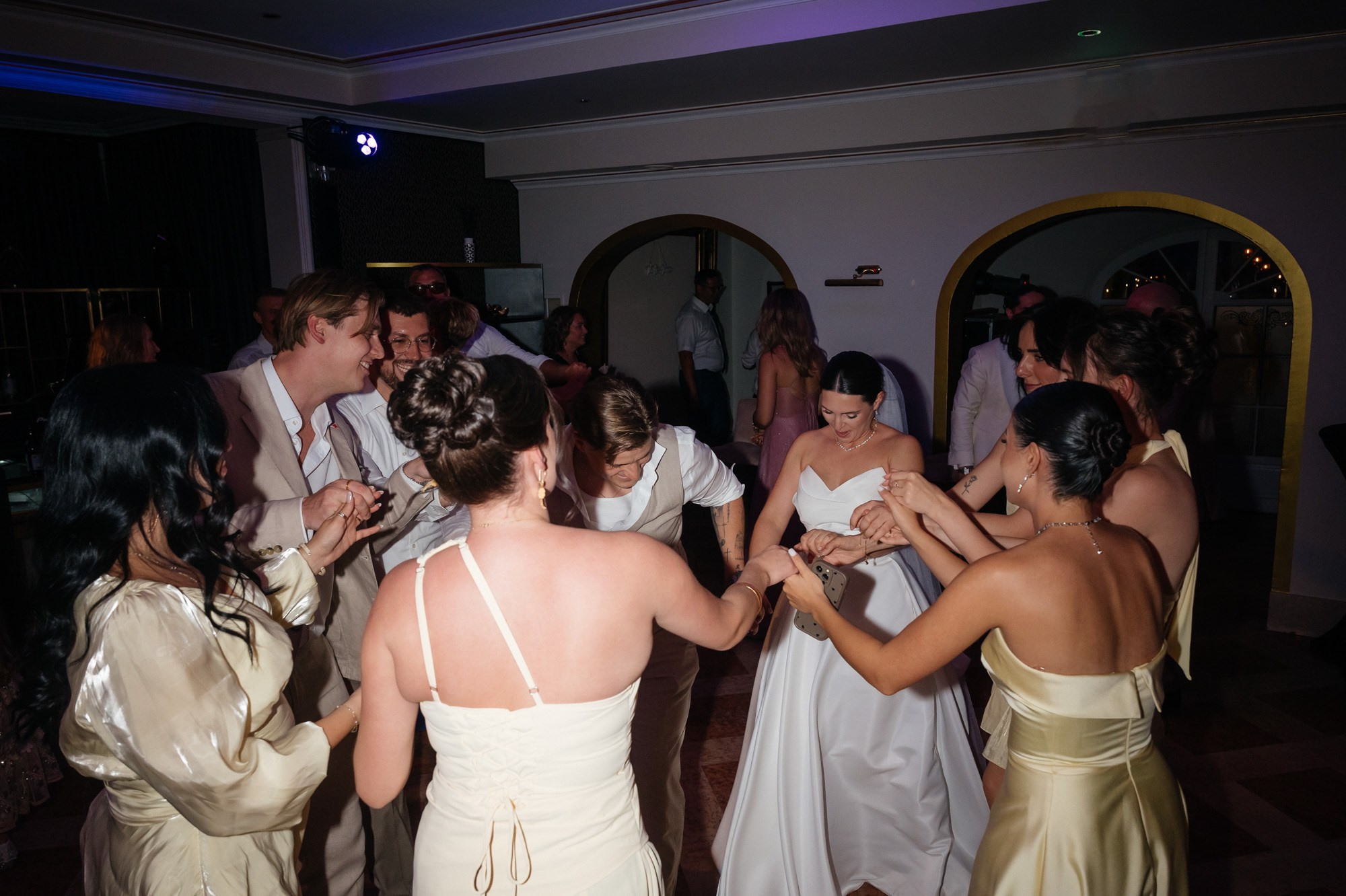 Bride dancing with her friends