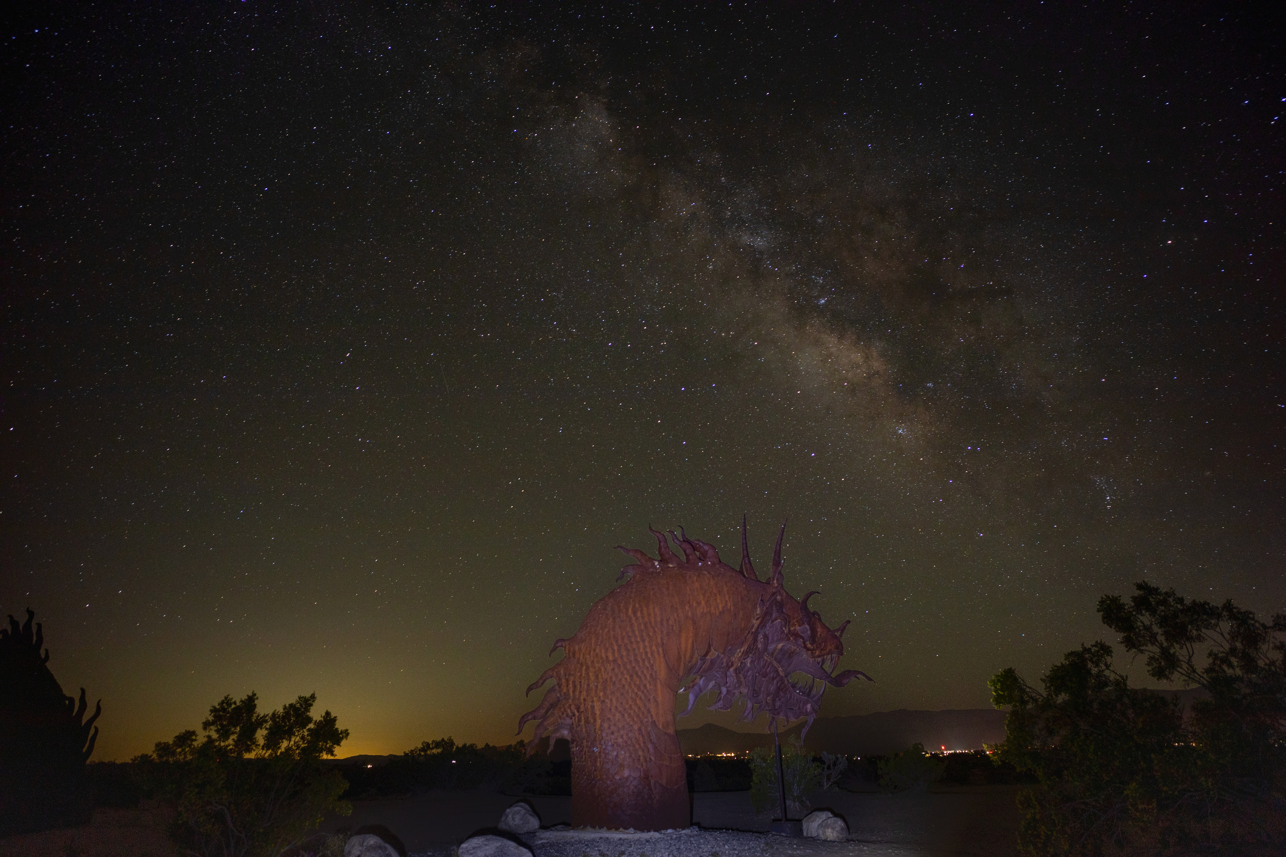 In Borrego Springs, a massive rusted metal dragon rises from the sand, its silhouette etched against the sweep of the Milky Way. Under the starry night, the sculpture feels alive—an ancient sentinel watching over the desert. Alone in the darkness, I framed this moment where art, earth, and cosmos converged, capturing the quiet power of a creature forged by human hands yet seemingly born from myth.