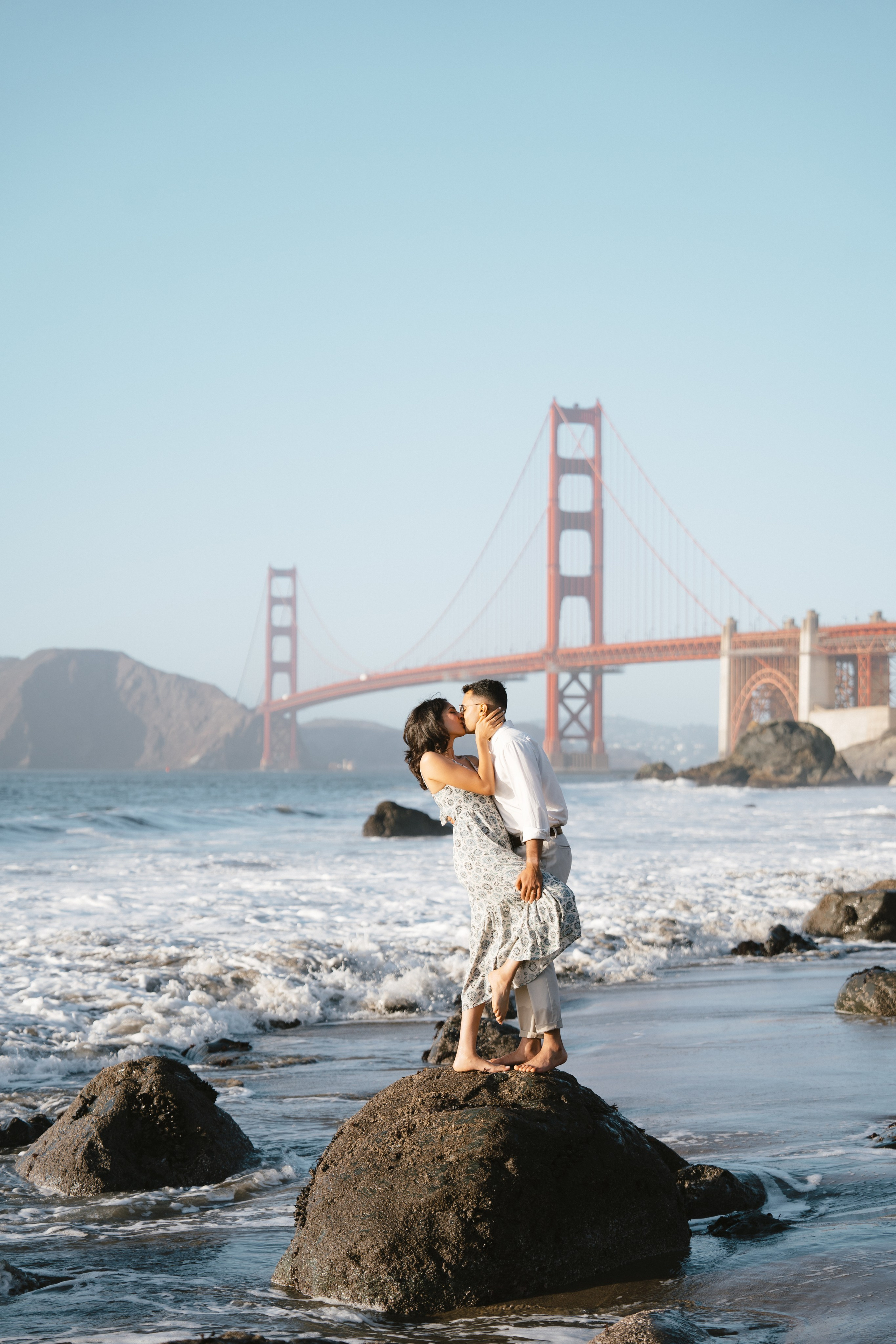 Engagement and Couple’s Photoshoot at Marshall’s Beach with iconic Golden Gate bridge view. Soulo Photography | San Francisco Bay Area Based Photographer