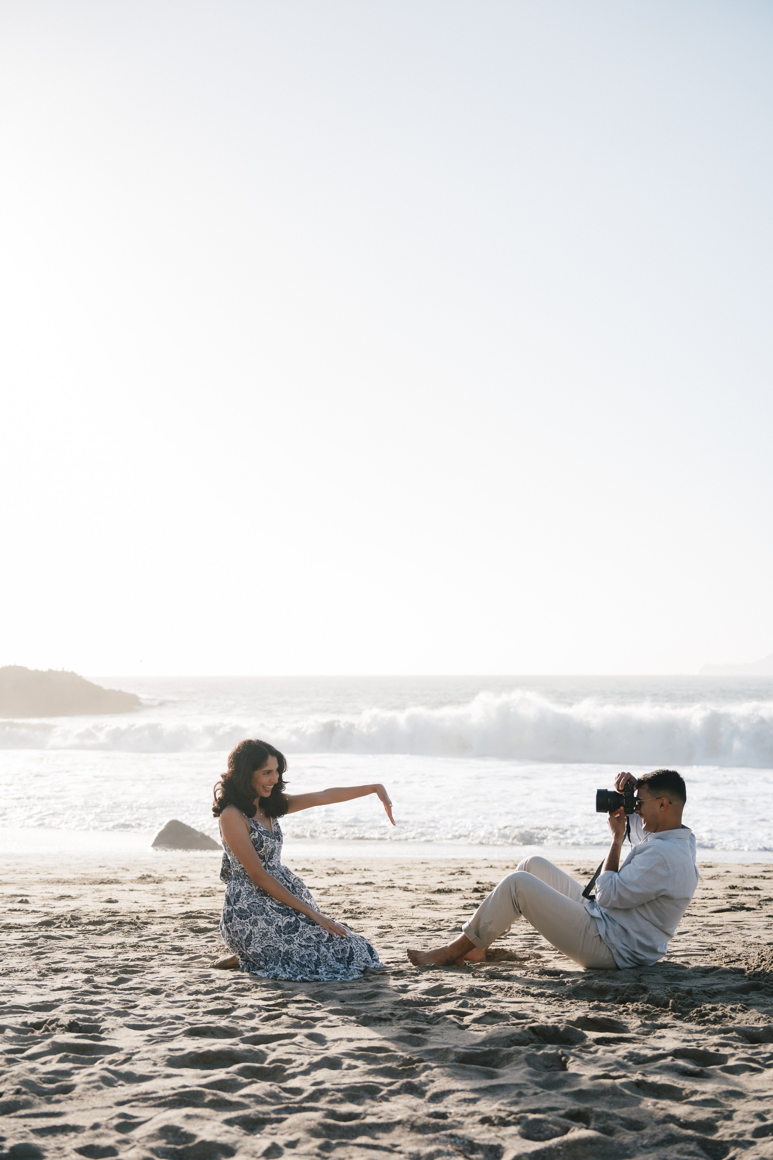 Engagement and Couple’s Photoshoot at Marshall’s Beach with iconic Golden Gate bridge view. Soulo Photography | San Francisco Bay Area Based Photographer