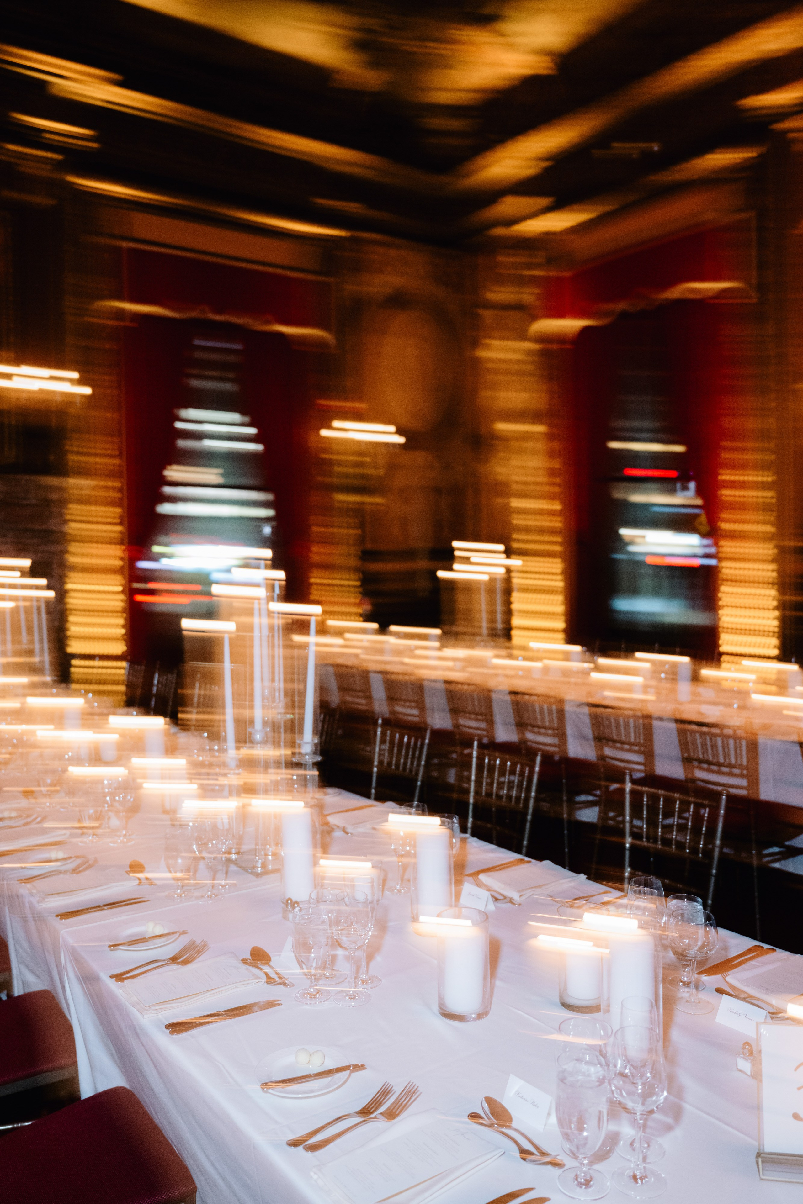 a long table with white tablecloths