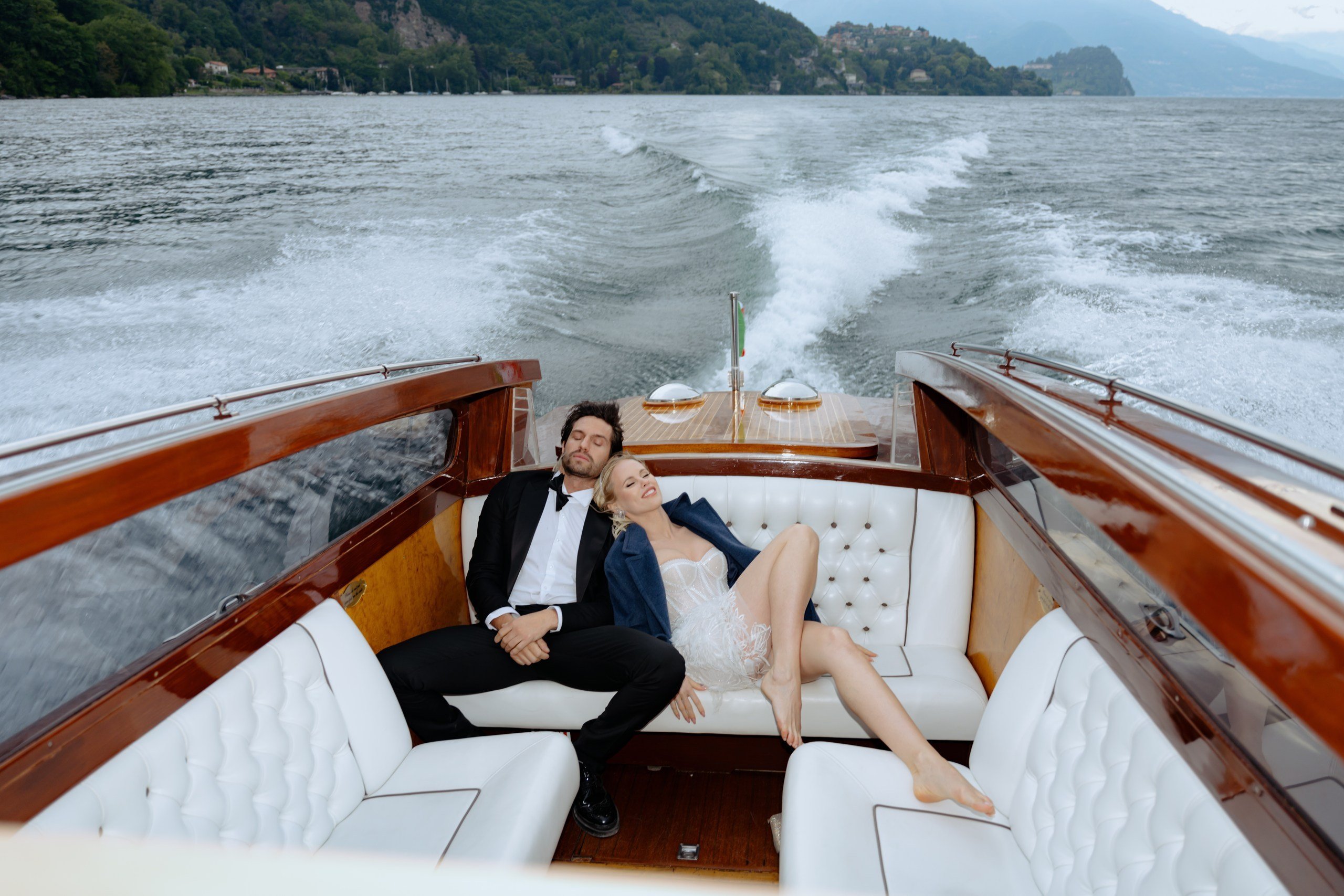 Bride and groom enjoying boat ride on Lake Como at Villa Aura Italy