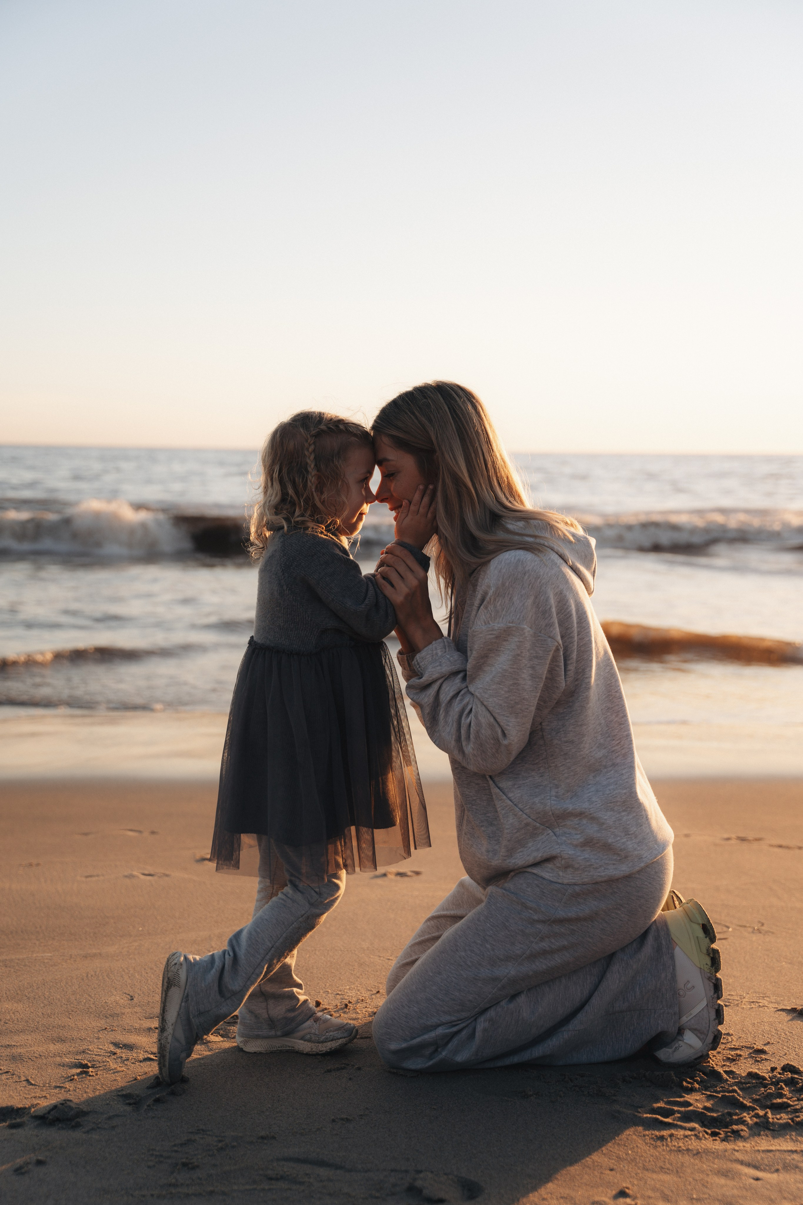 Family photoshoot. Family photoshoot outside. Beach photoshoot. Family holiday photoshoot. Sunset photoshoot