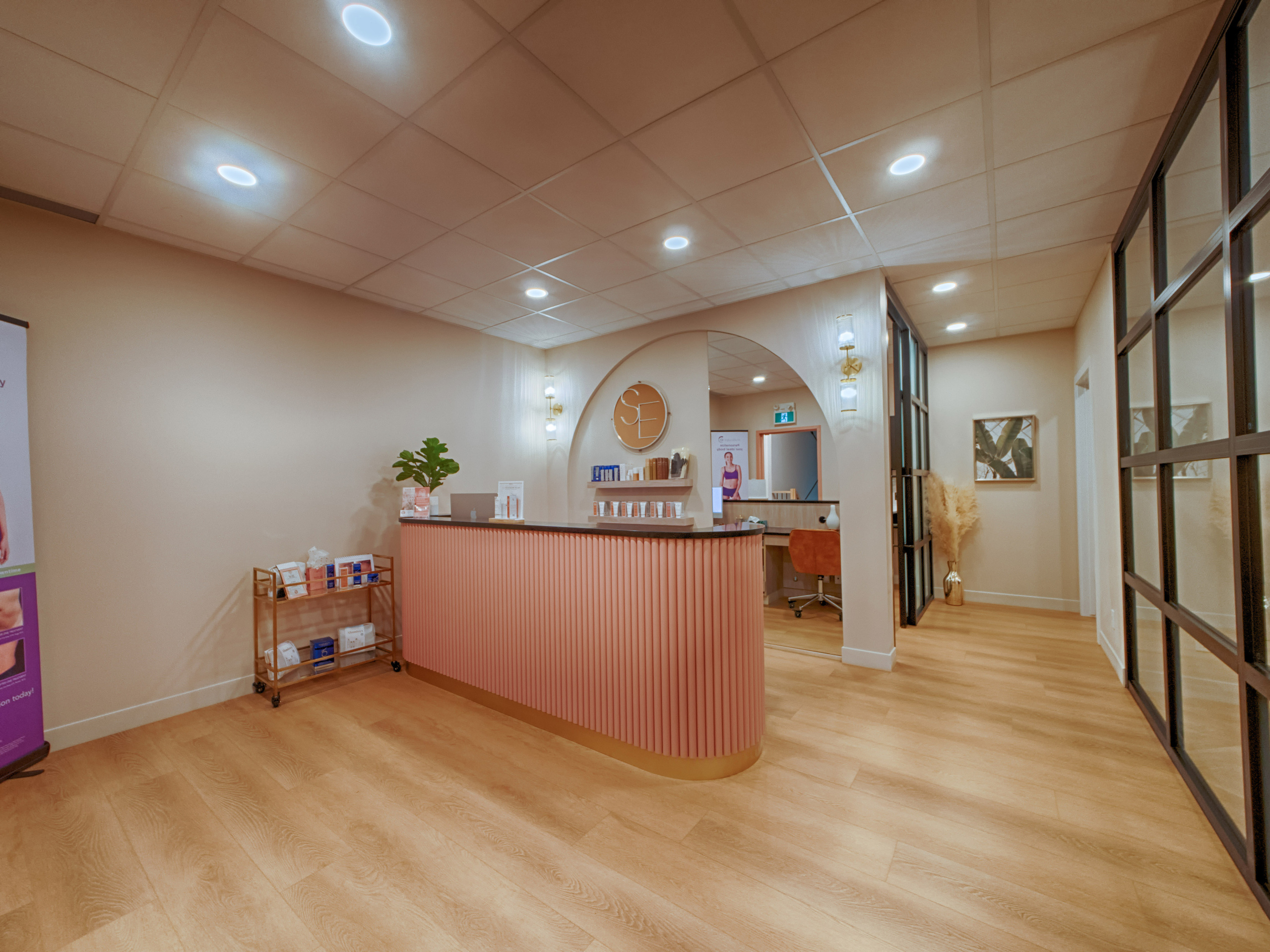 Brightly lit reception area with plants