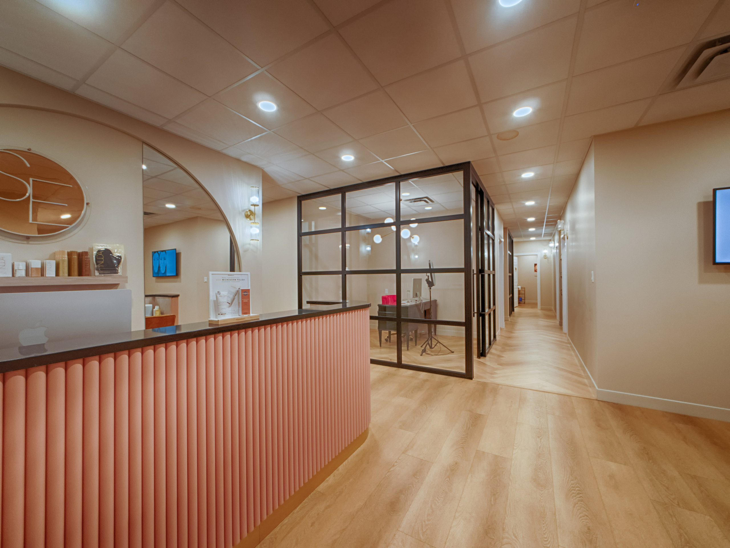 Brightly lit reception area with plants