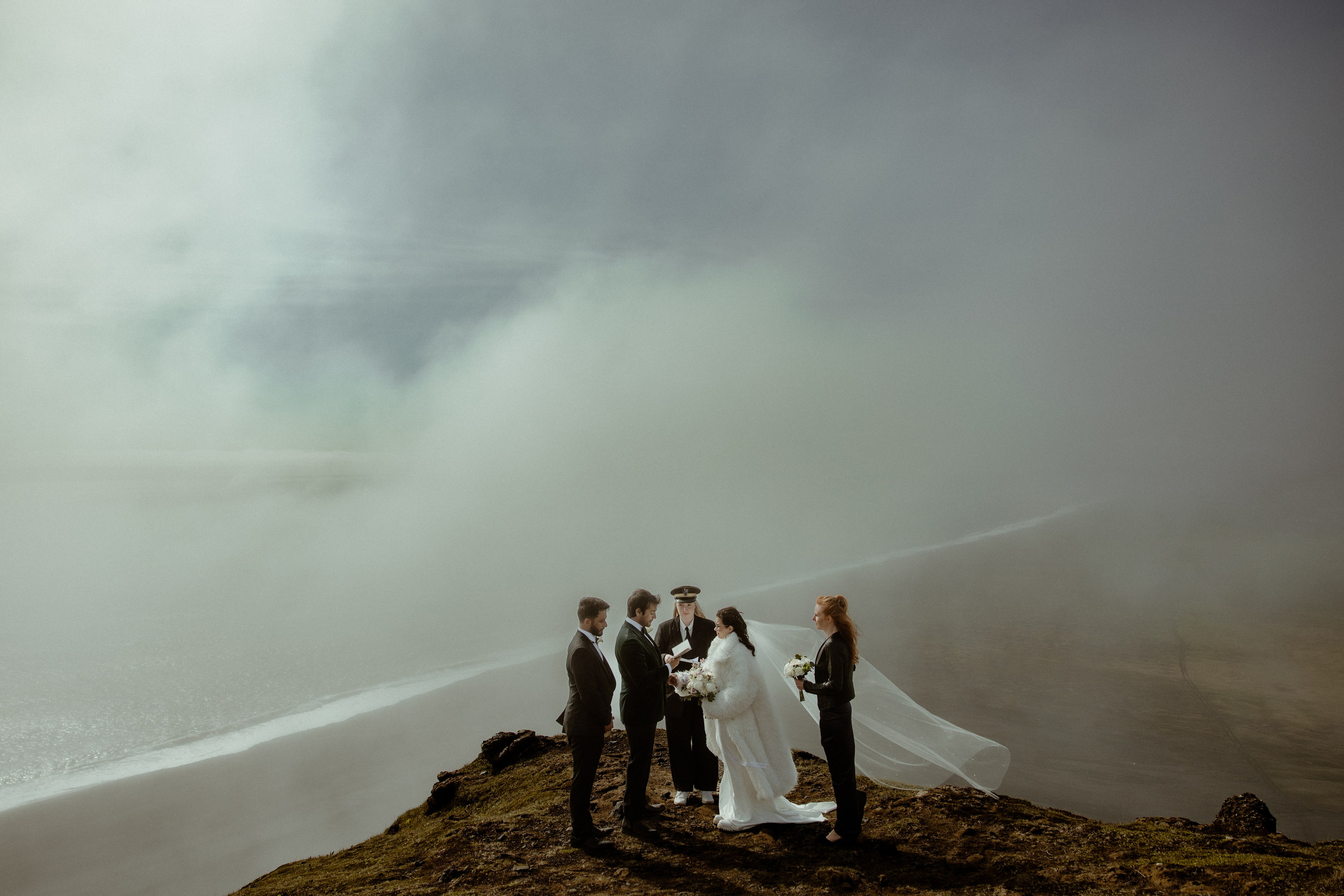 Iceland elopement at endless black sand beach. Iceland elopement photographer & videographer