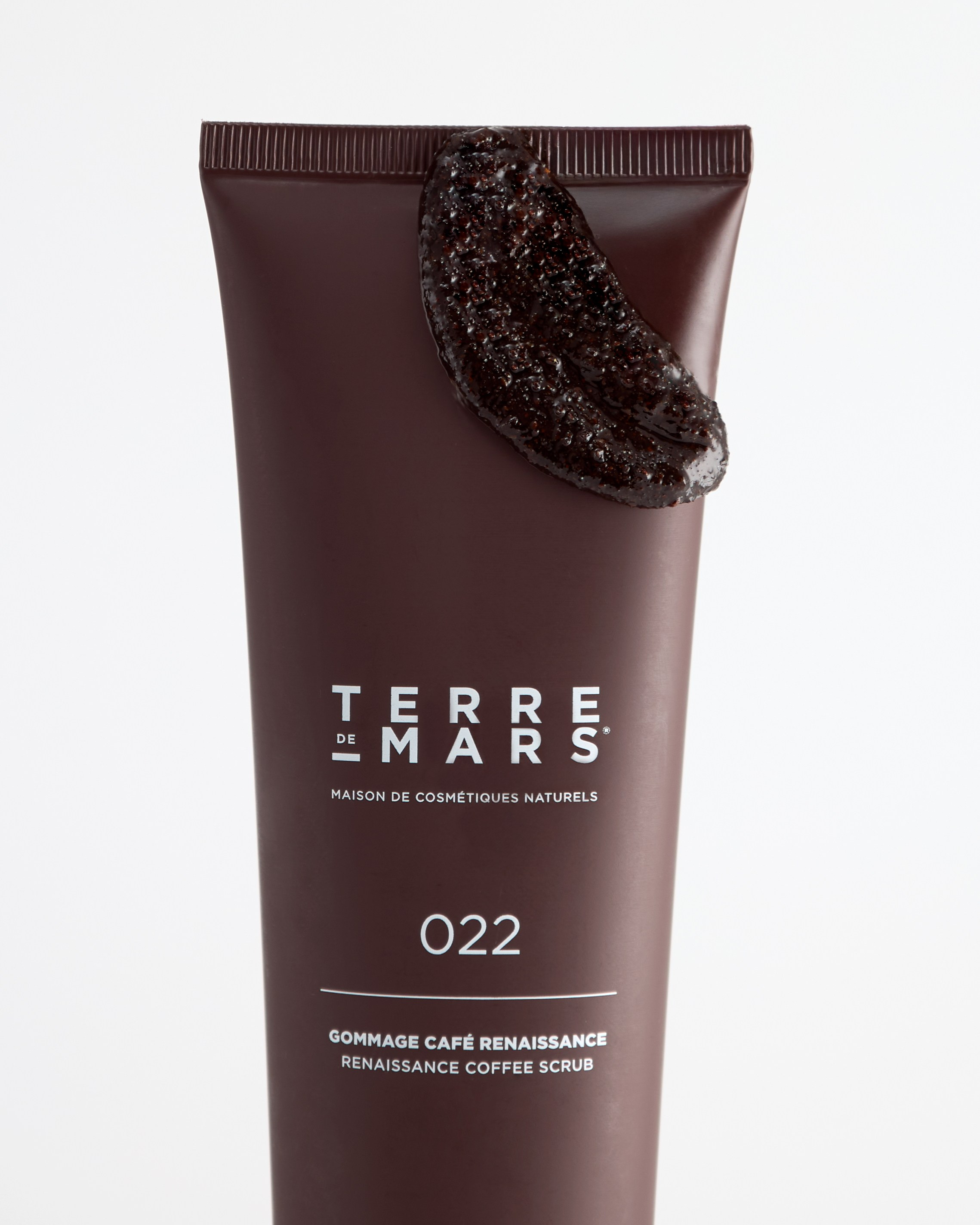 Textur von Kaffee-Peeling auf Tube, kreative Werbefotografie, Content-Fotografie für Social Media, Produktpräsentation und Marketing