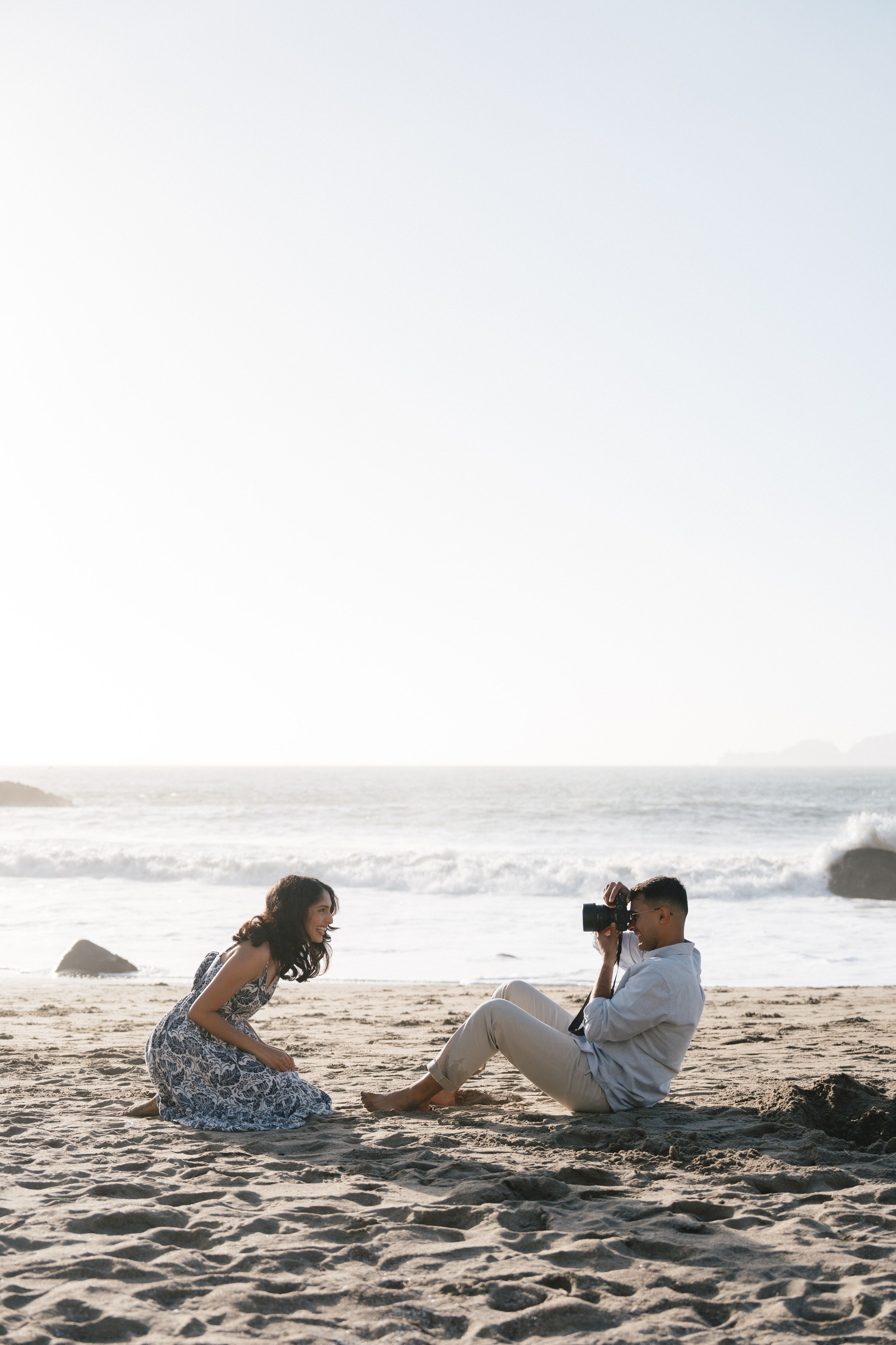 Engagement and Couple’s Photoshoot at Marshall’s Beach with iconic Golden Gate bridge view. Soulo Photography | San Francisco Bay Area Based Photographer